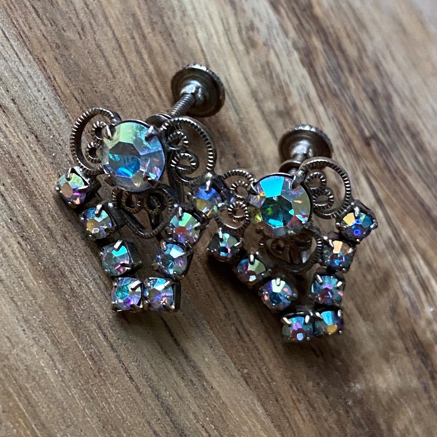 Vintage iridescent rhinestone clip on earrings with filigree accents, screwback ab rhinestone earrings