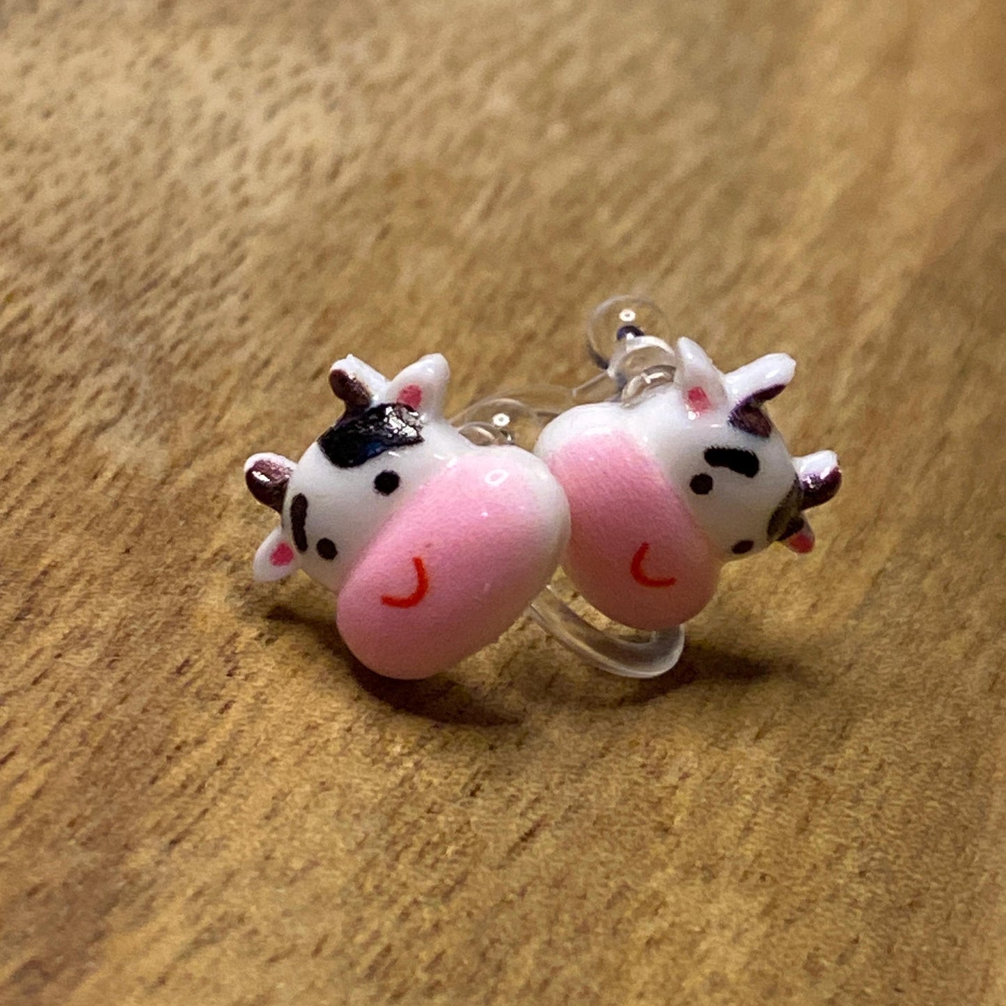 Tiniest little cow invisible clip on earrings, adorable Cow earrings