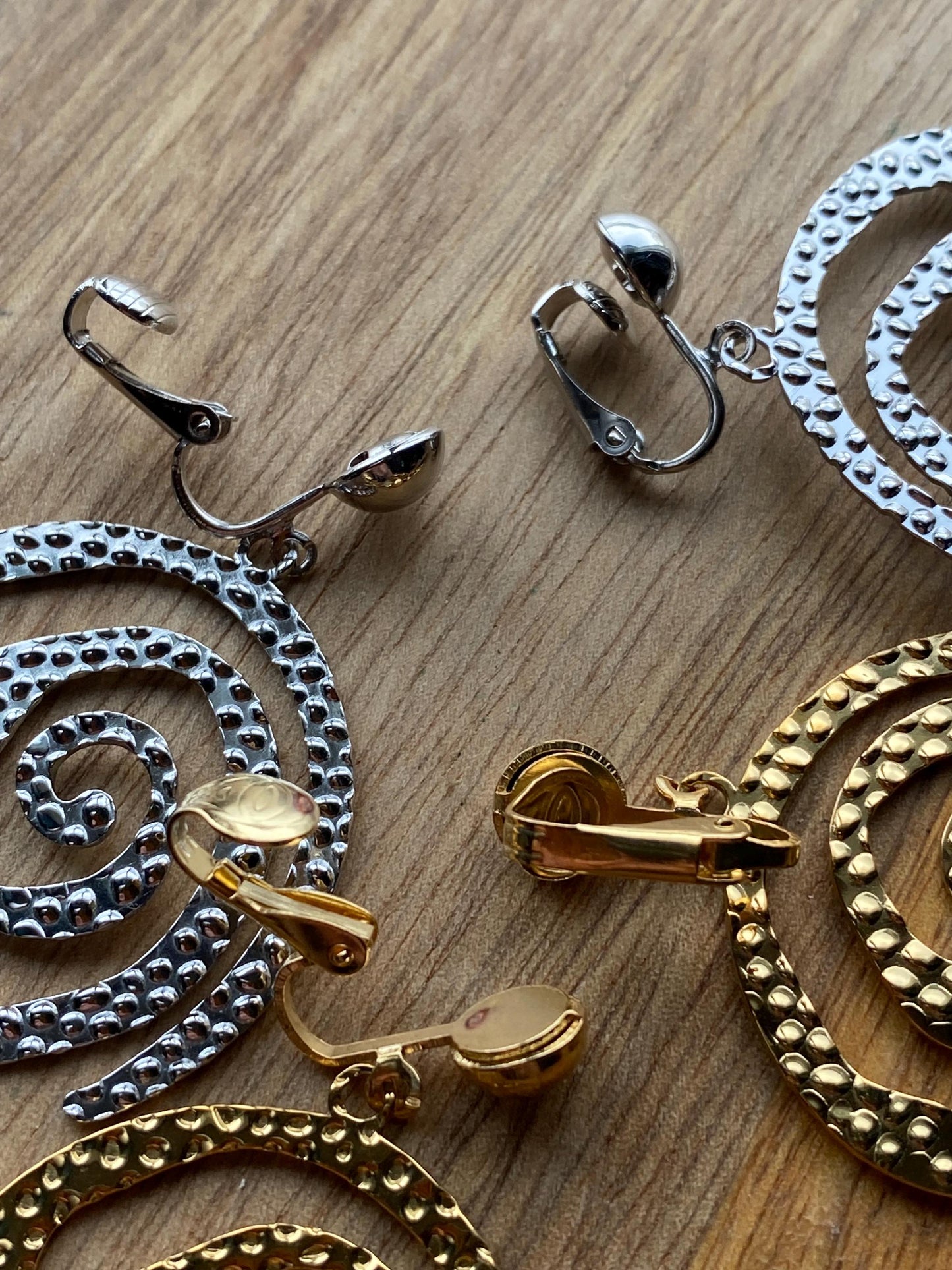 Dangling abstract gold or silver swirl clip on earrings