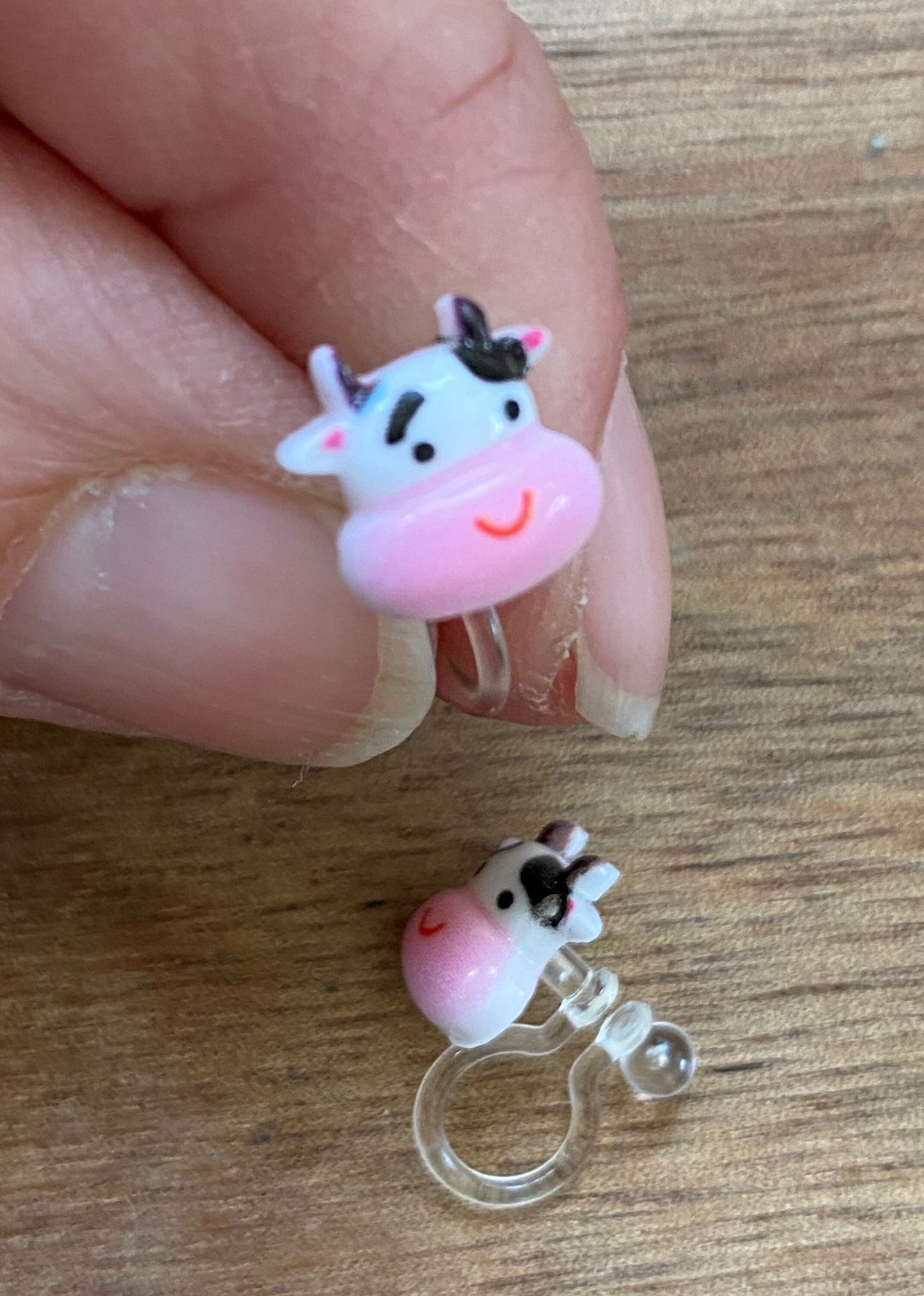 Tiniest little cow invisible clip on earrings, adorable Cow earrings