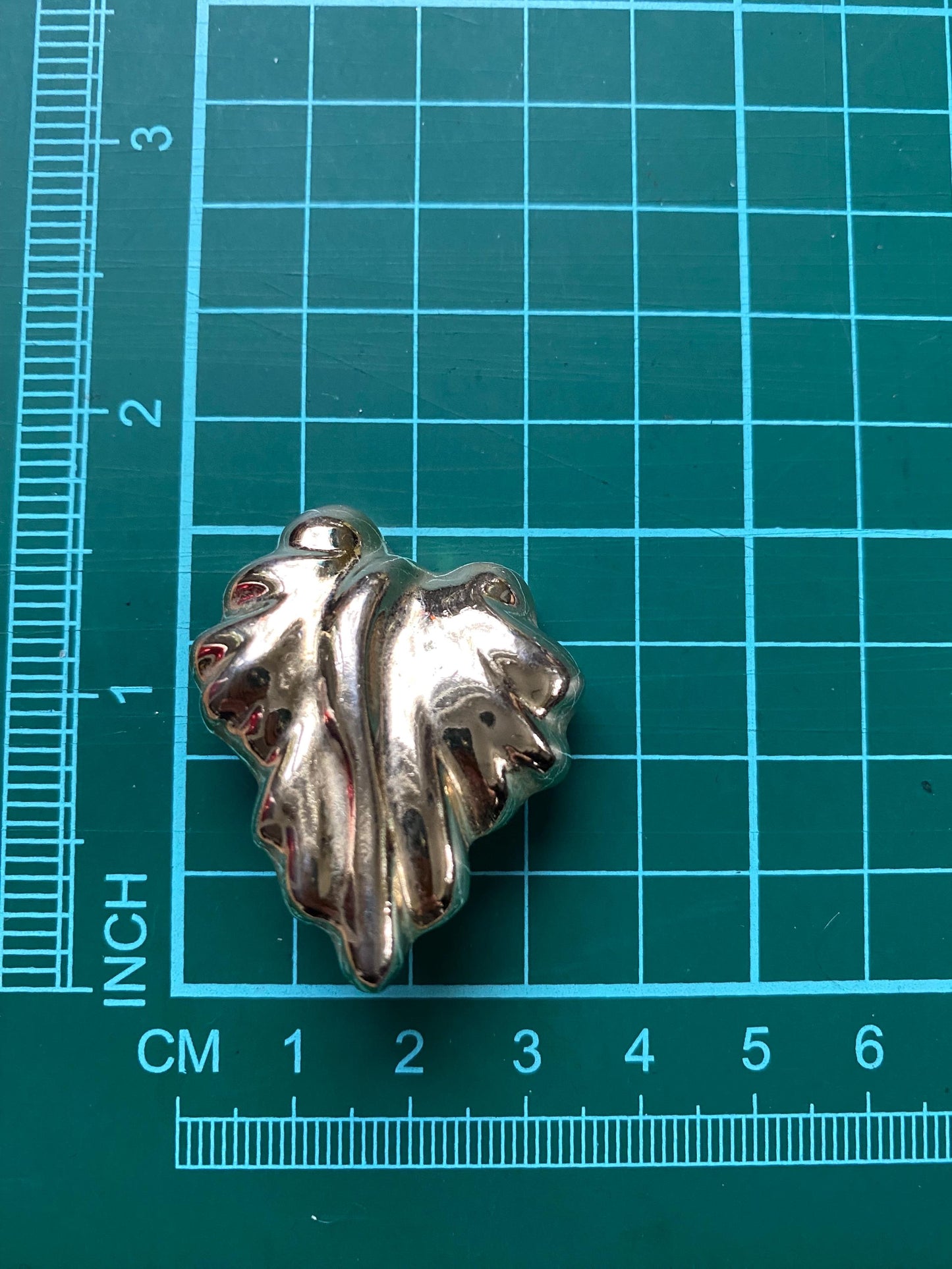 Vintage gold clip on earrings, leaf shaped earrings