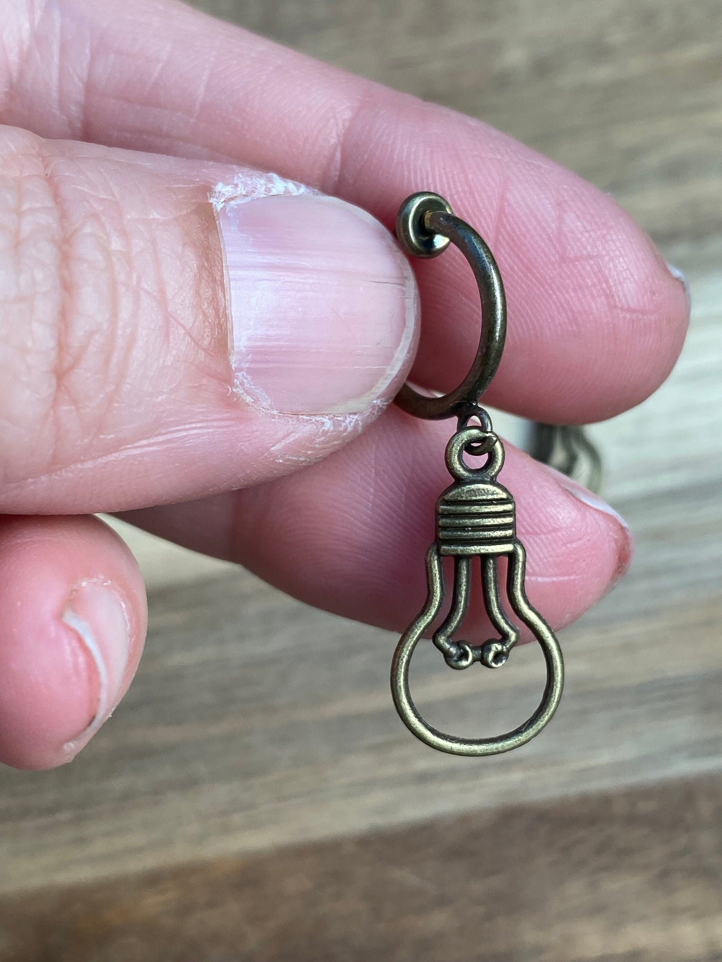 Adorable dangling lightbulb clip on earrings, cute bronze or silver earrings