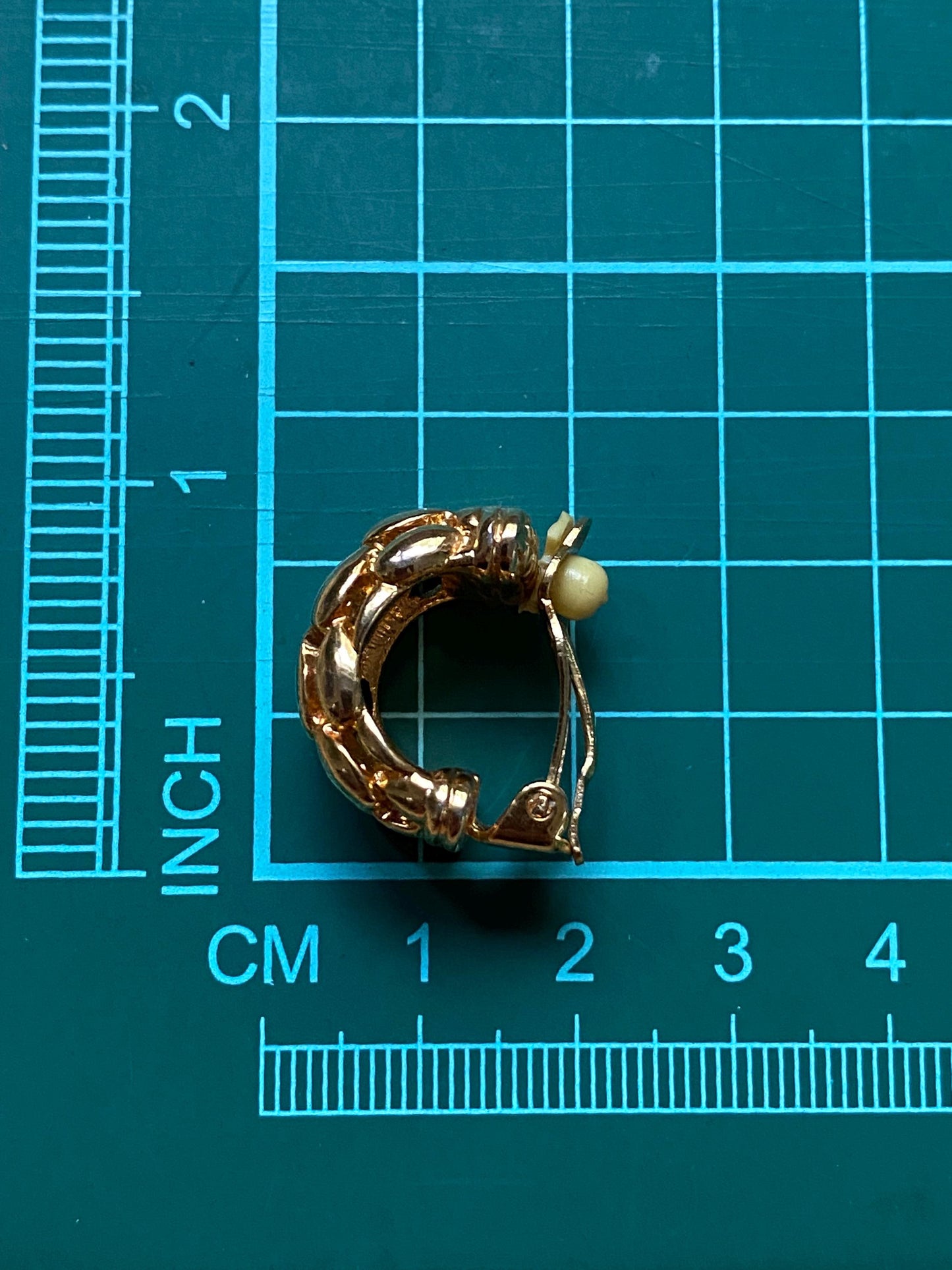 Vintage gold clip on half hoop earrings with a woven texture