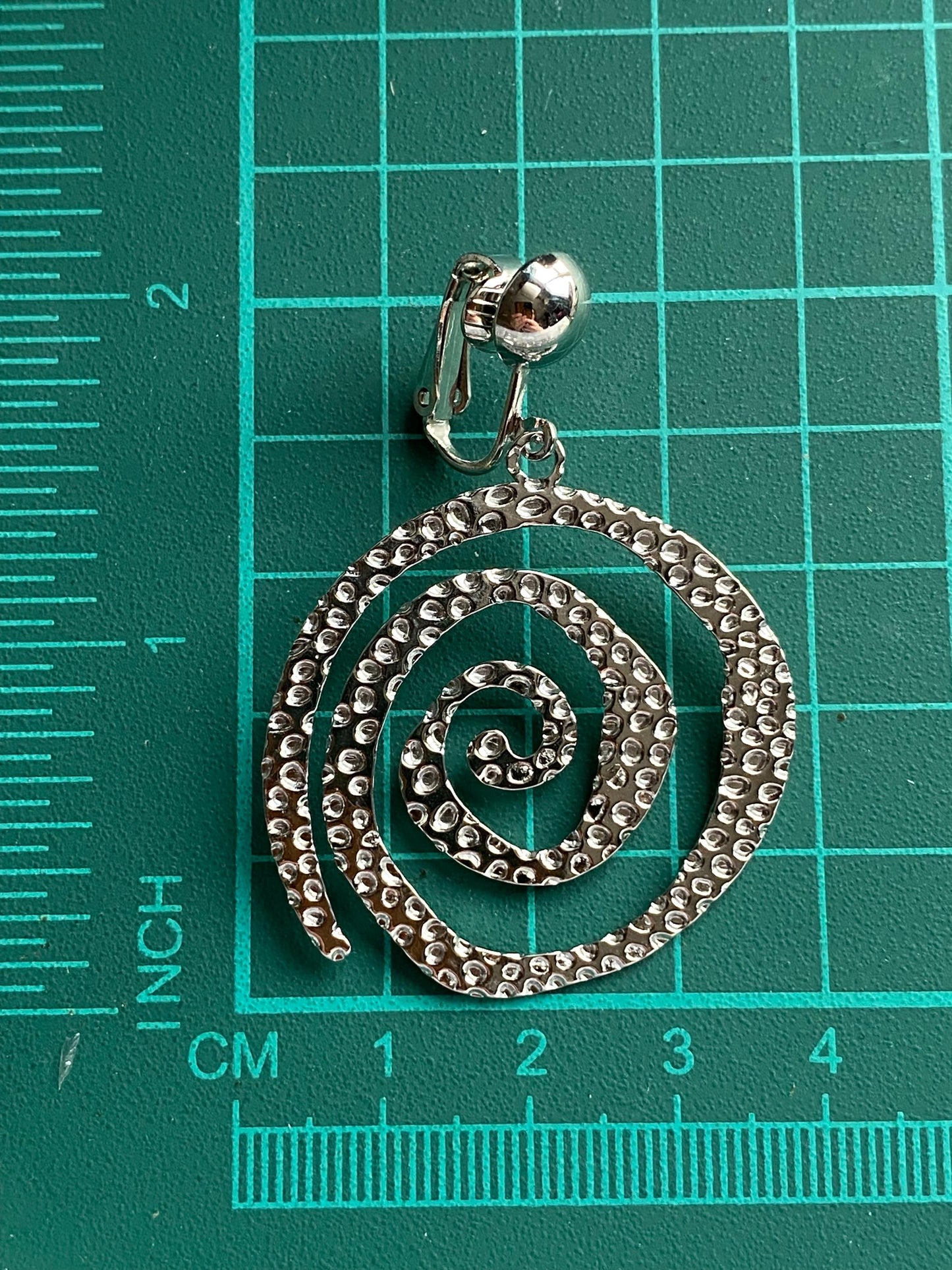 Dangling abstract gold or silver swirl clip on earrings