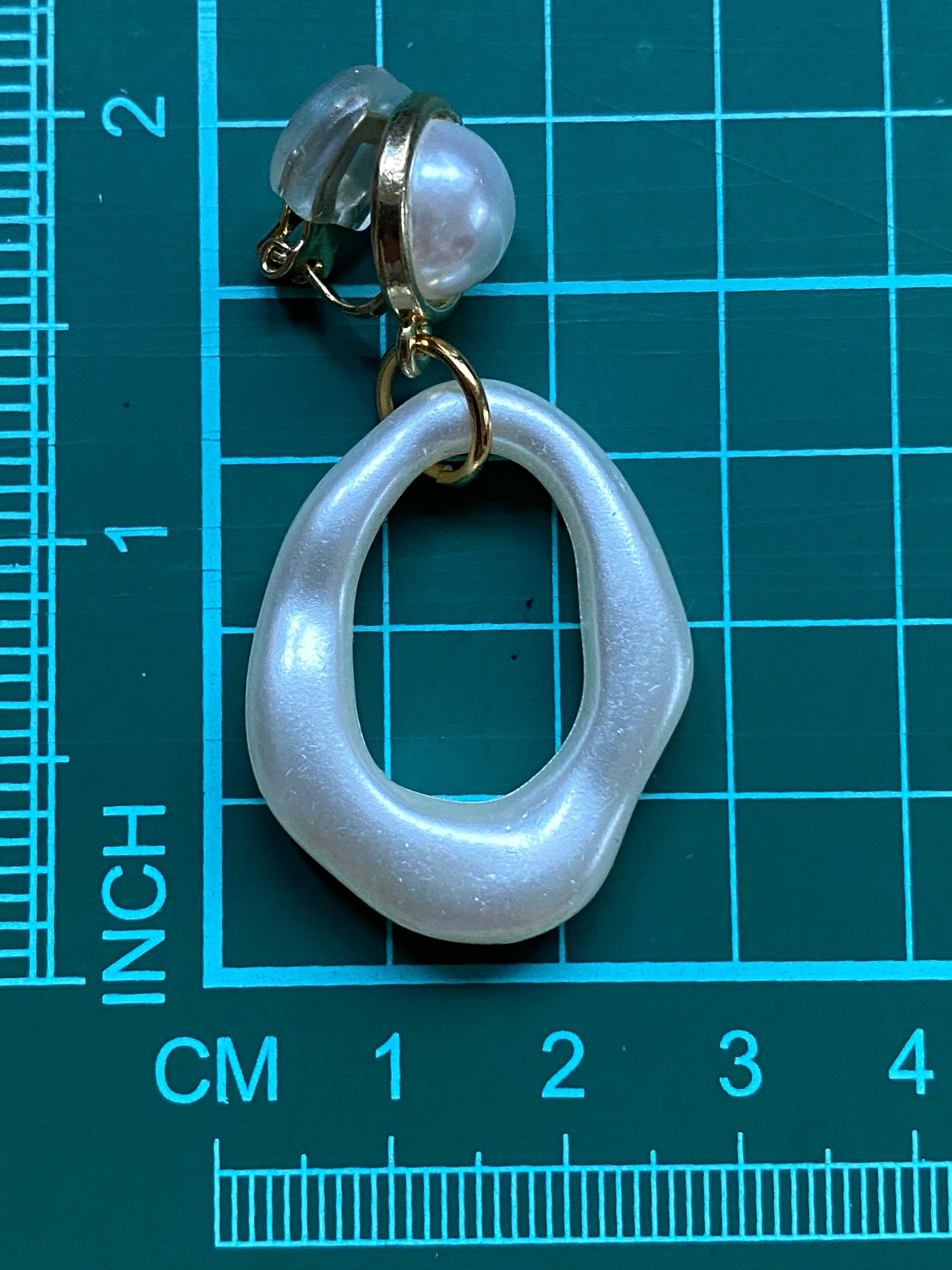 Clip on dangling faux pearl hoop earrings, irregular hoops