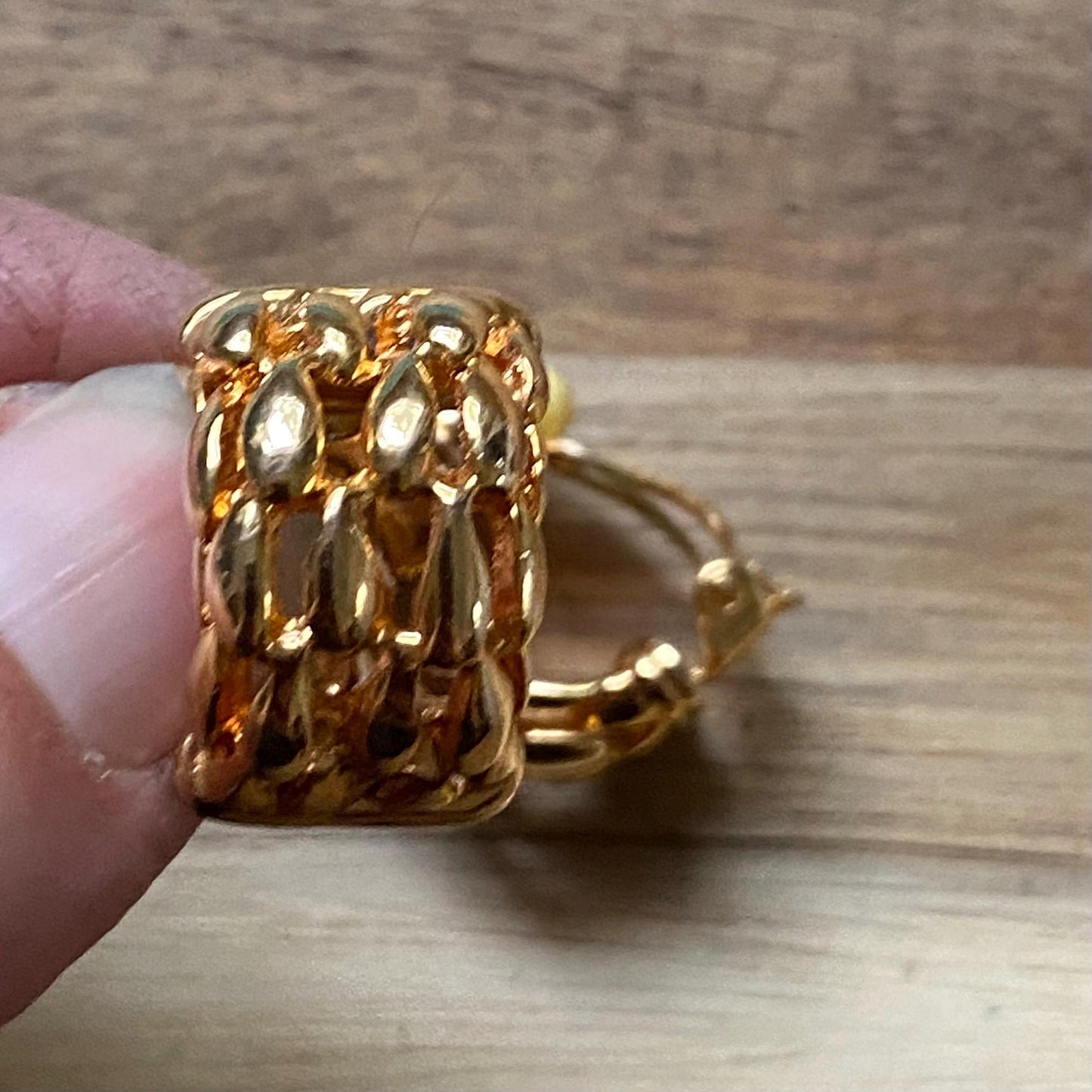 Vintage gold clip on half hoop earrings with a woven texture