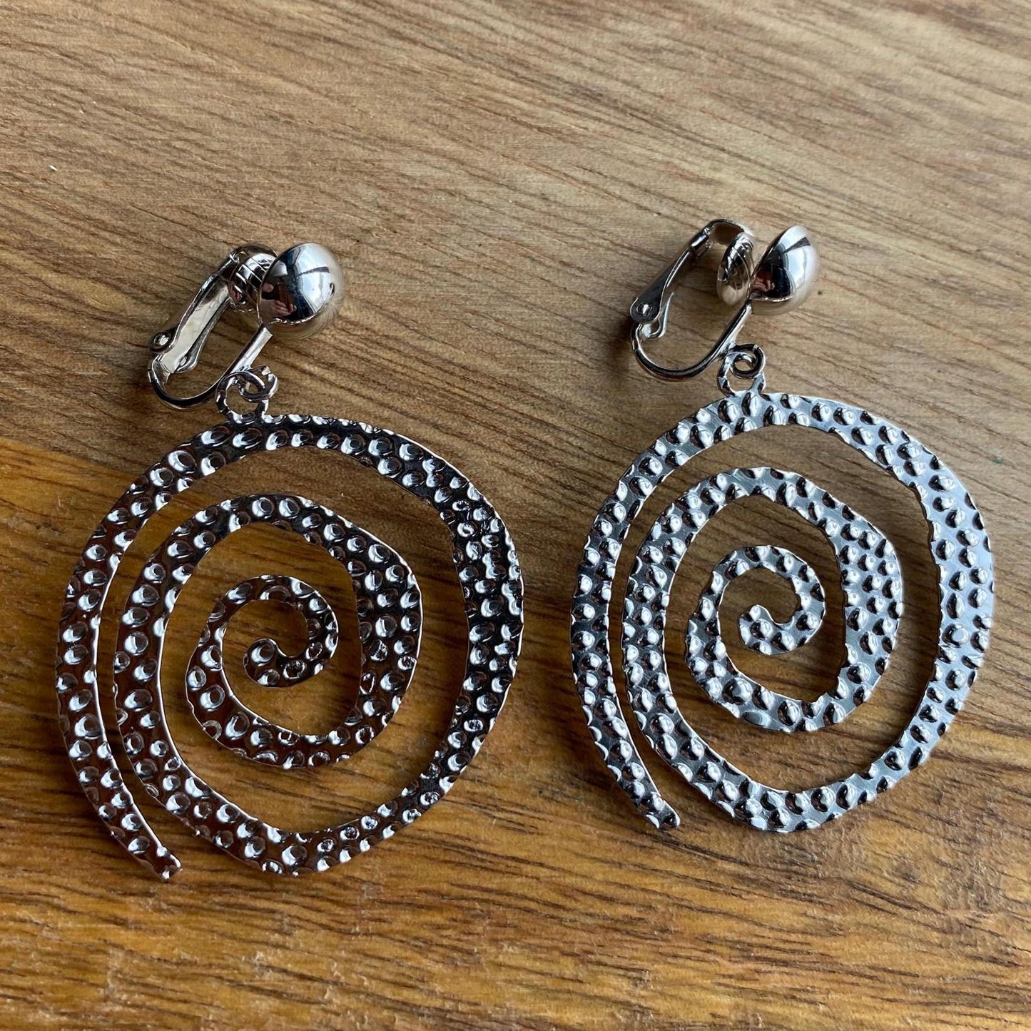 Dangling abstract gold or silver swirl clip on earrings