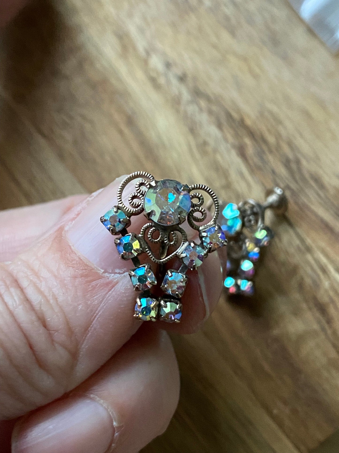 Vintage iridescent rhinestone clip on earrings with filigree accents, screwback ab rhinestone earrings