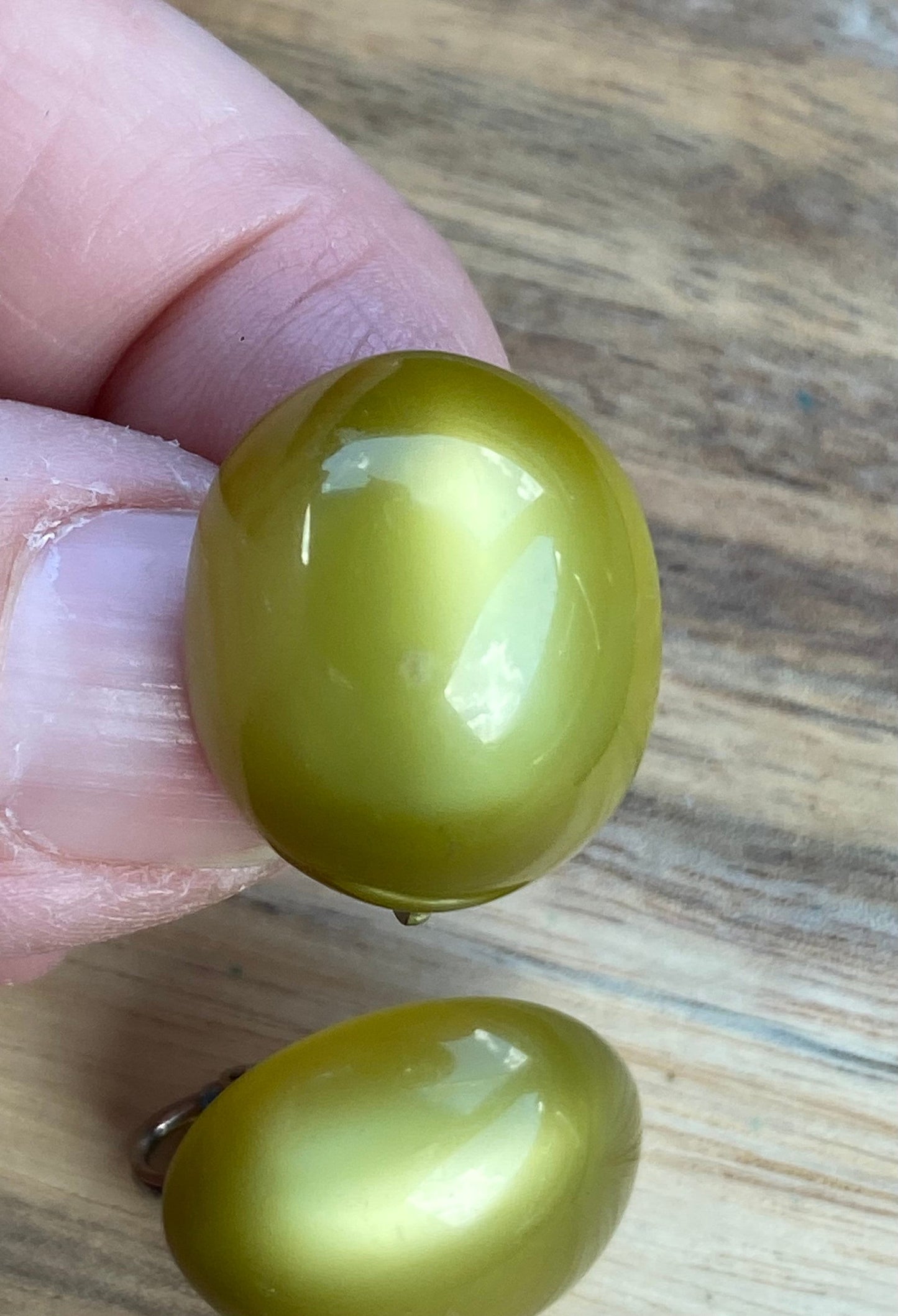 Vintage luminous olive green moonglow cabochon oval clip on earrings, Richelieu earrings