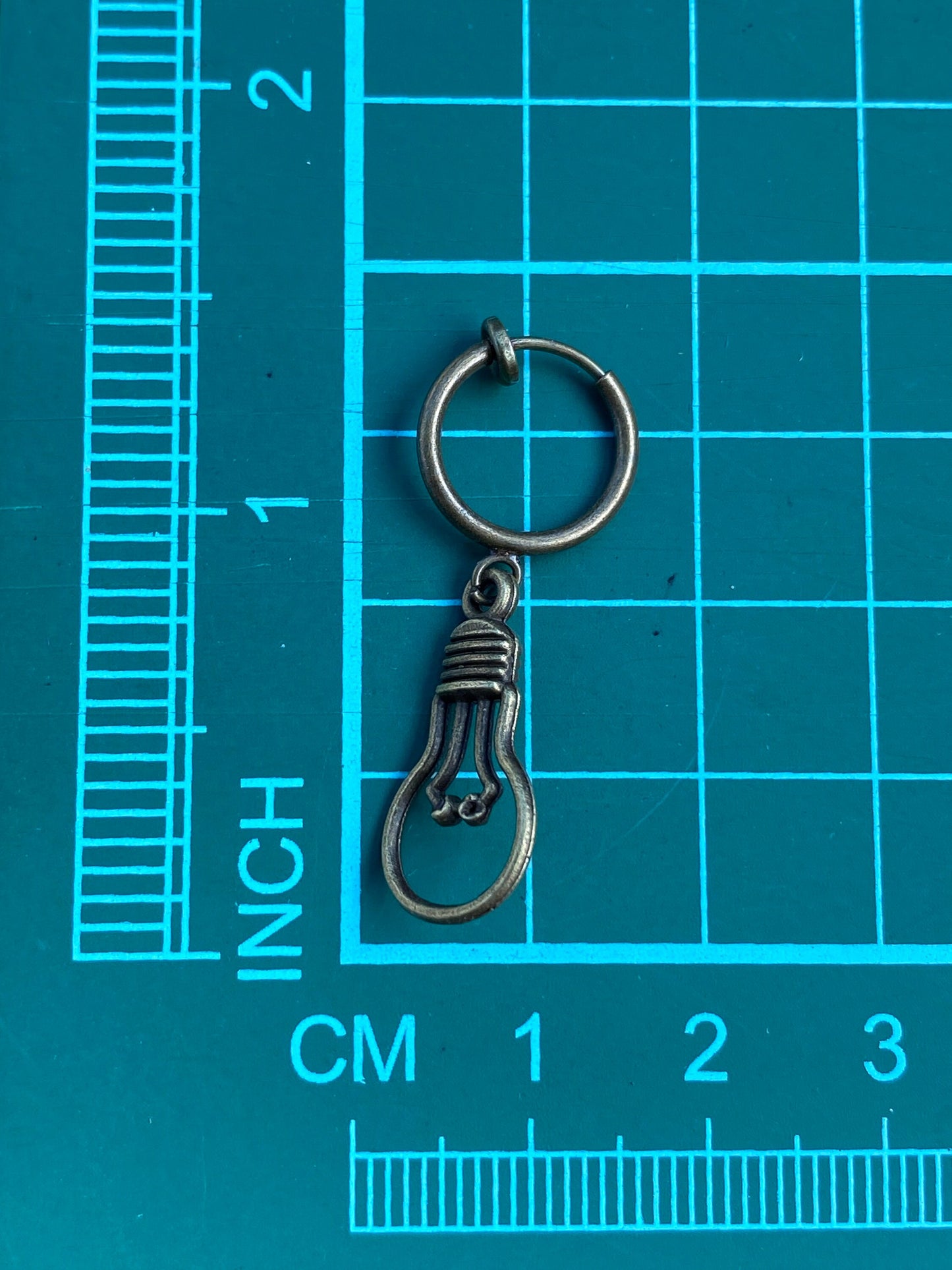 Adorable dangling lightbulb clip on earrings, cute bronze or silver earrings