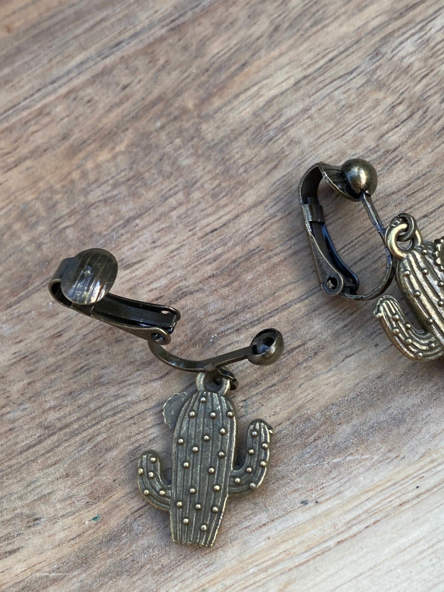 Dangling cactus clip on earrings, metal ear clips