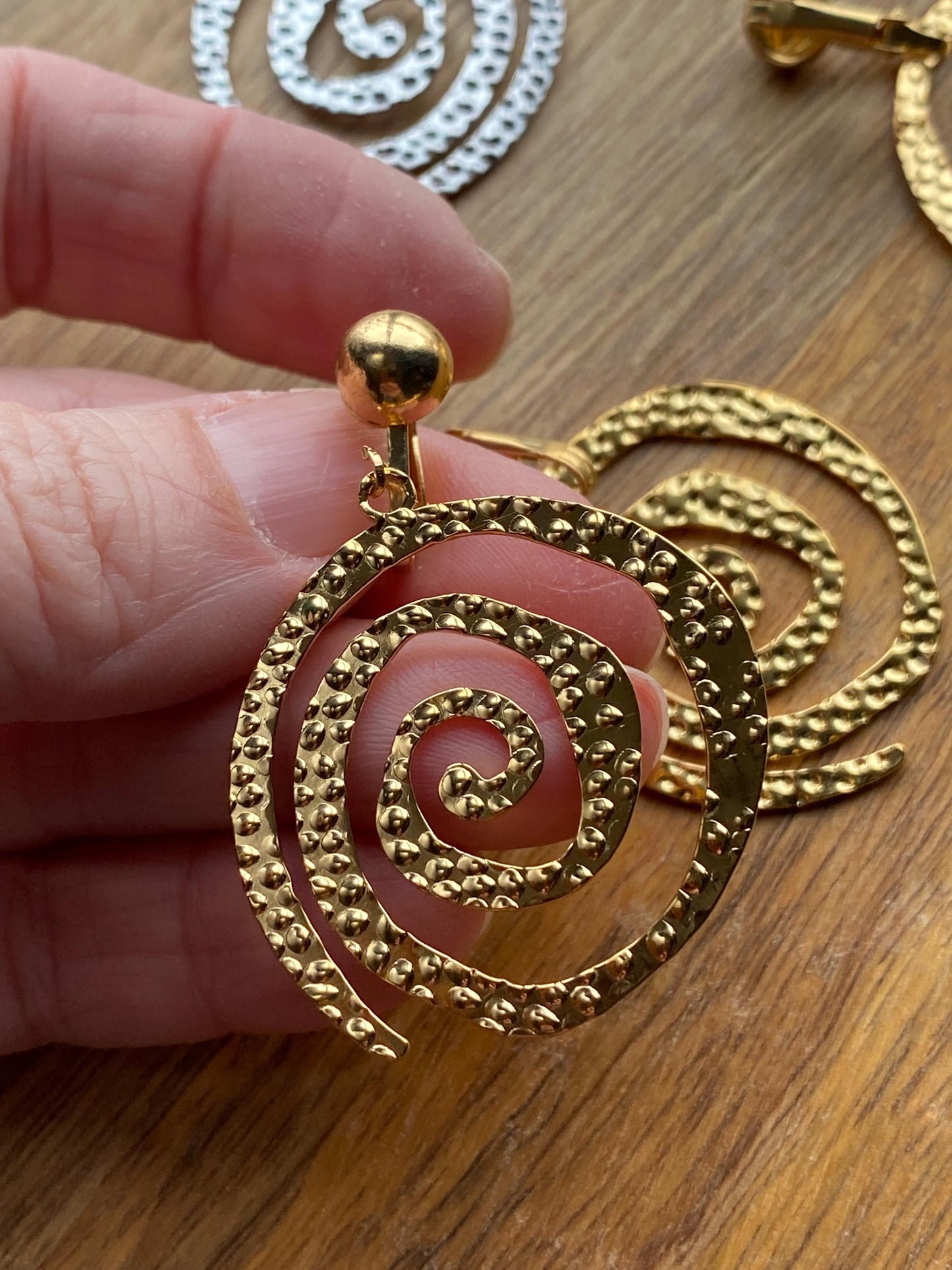 Dangling abstract gold or silver swirl clip on earrings