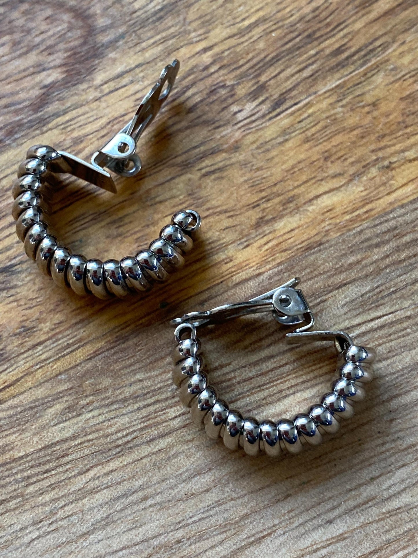 Vintage silver ribbed clip on earrings, half hoop earrings