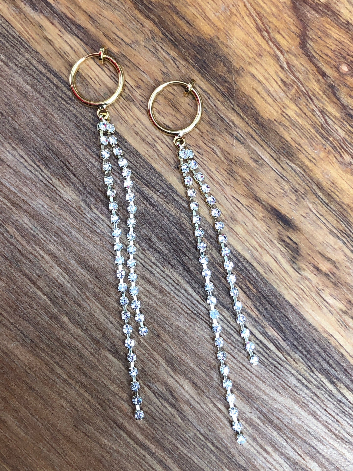 Adorable lightweight dangling rhinestone chains on clip on spring hoop earrings