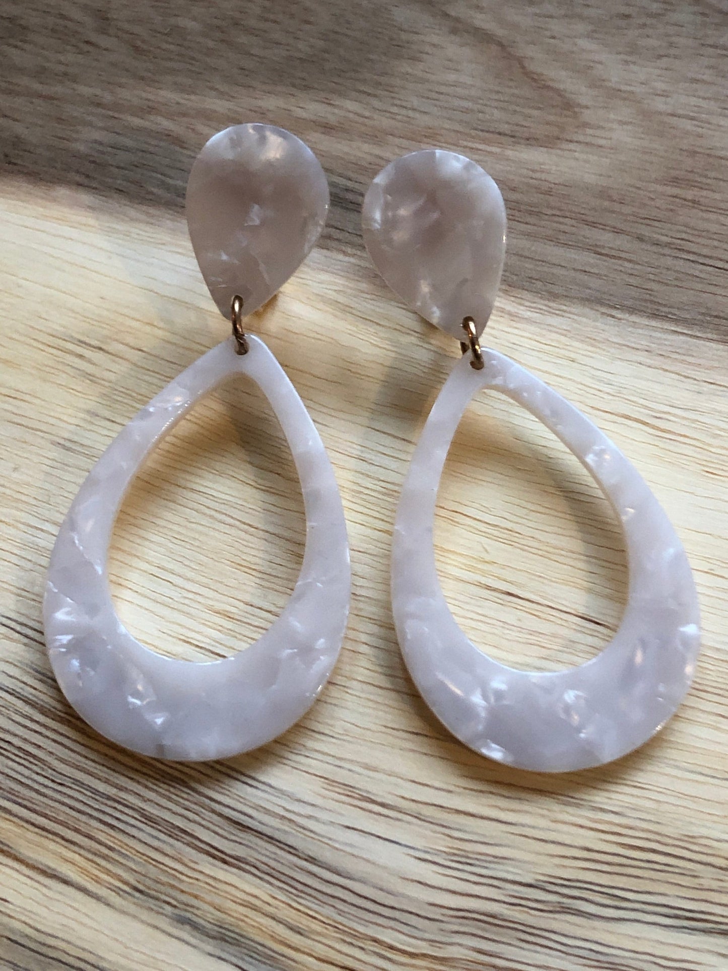 dangling teardrop shaped clip on earrings