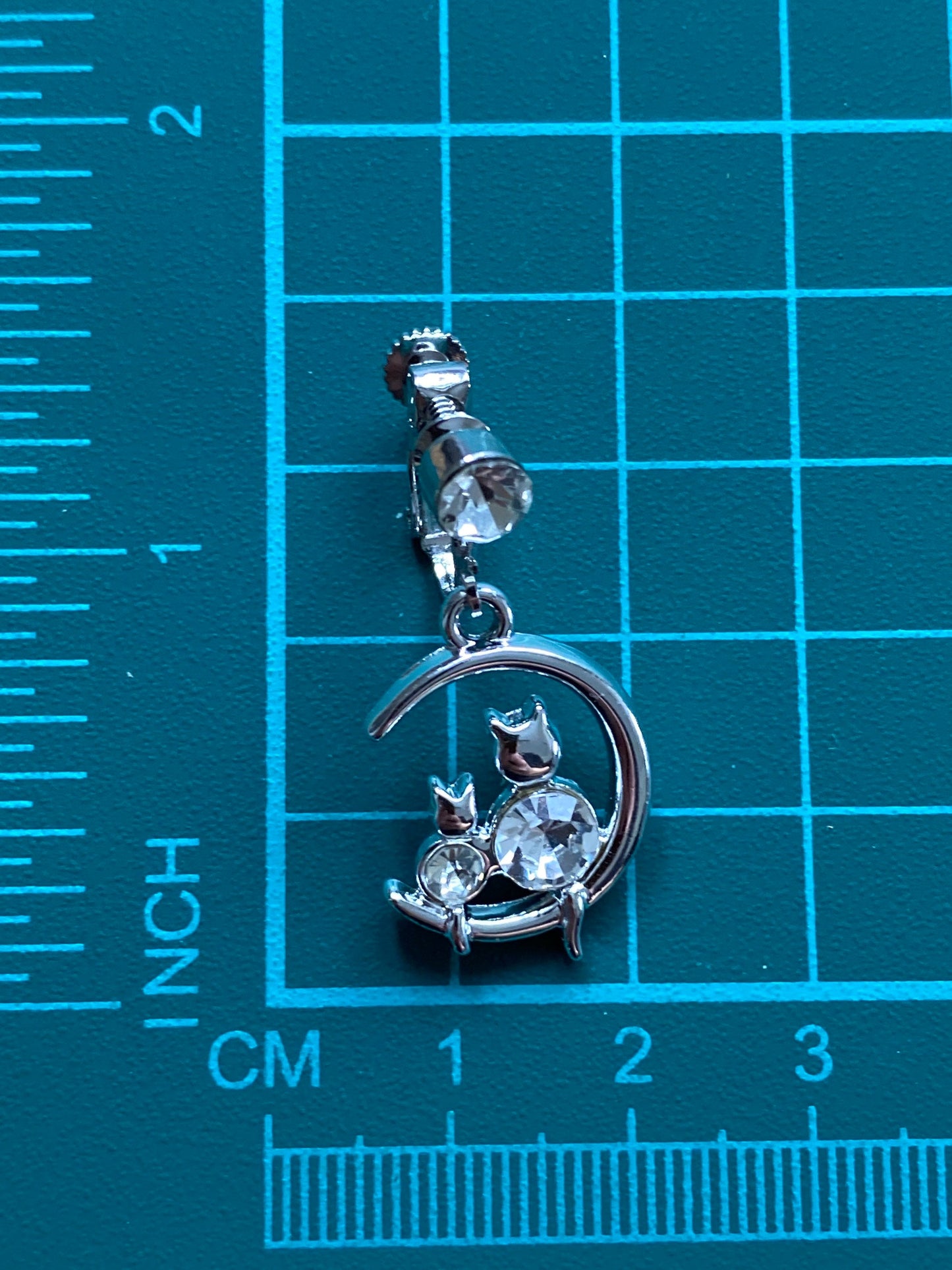 Dangling silver rhinestone moon and kitten clip on earrings (no piercing | screwback)
