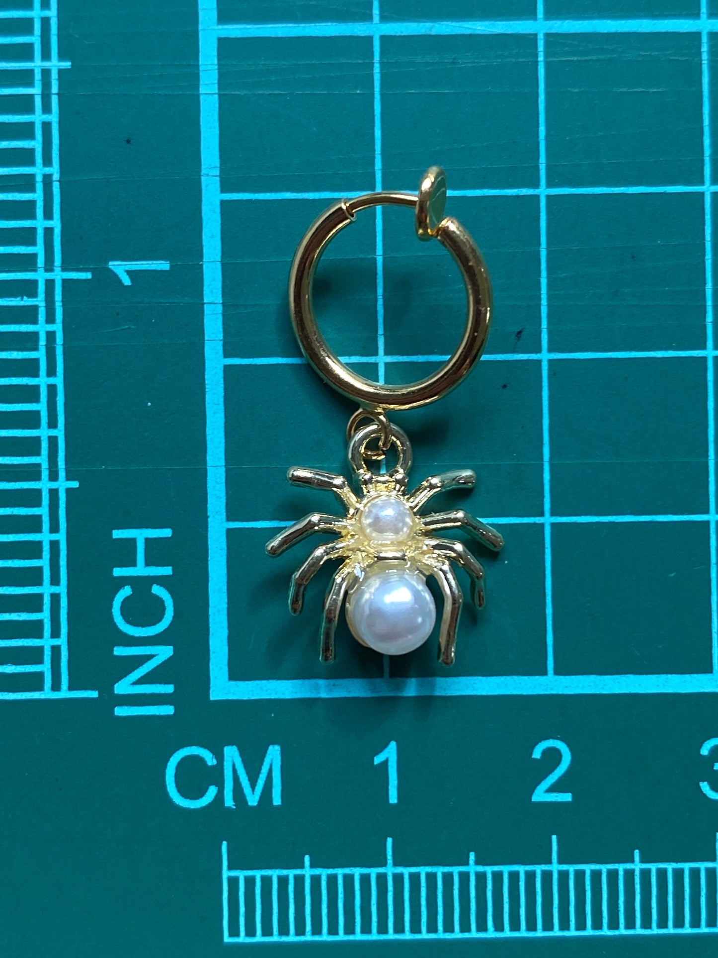 Gold and pearl dangling clip on spider earrings, faux pearl spring hoop spider earrings for unpierced ears