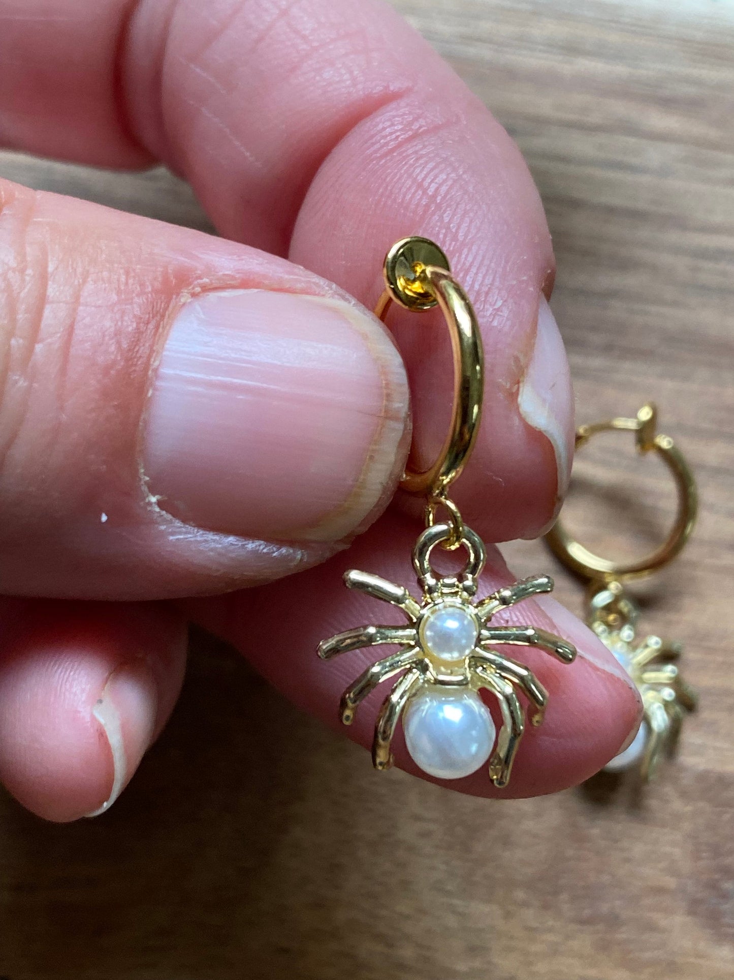 Gold and pearl dangling clip on spider earrings, faux pearl spring hoop spider earrings for unpierced ears