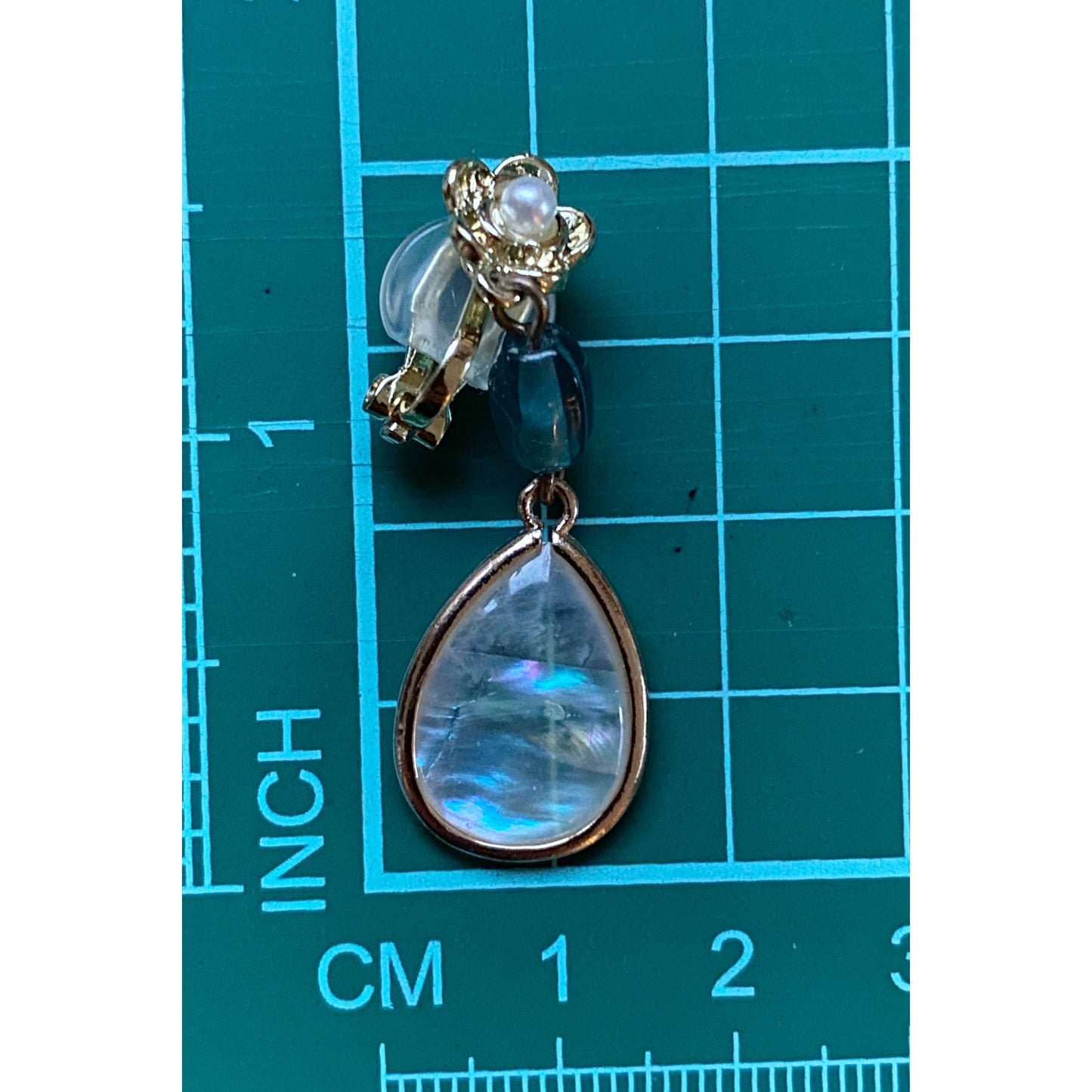 Gorgeous dangling shell teardrop clip on earrings, blue glass bead and shell earrings