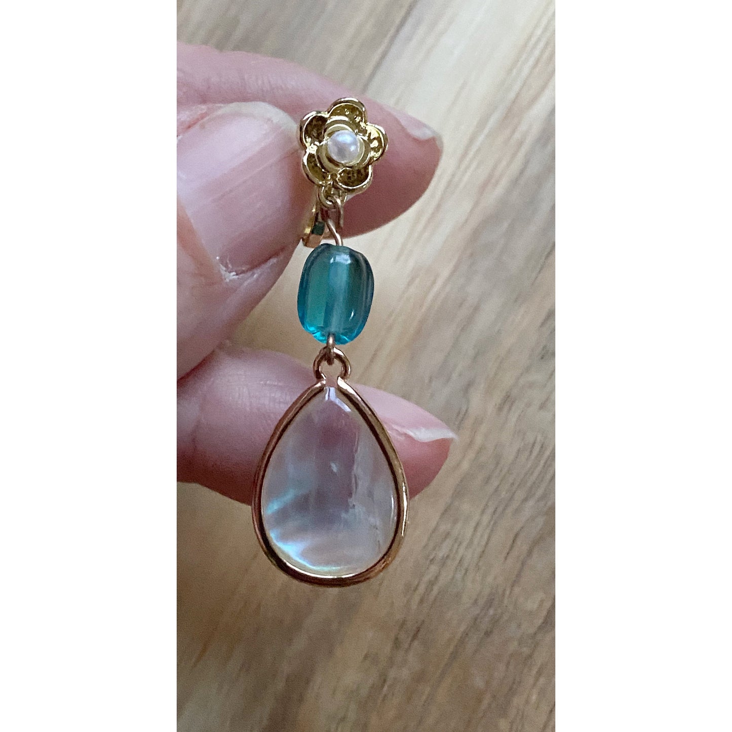 Gorgeous dangling shell teardrop clip on earrings, blue glass bead and shell earrings