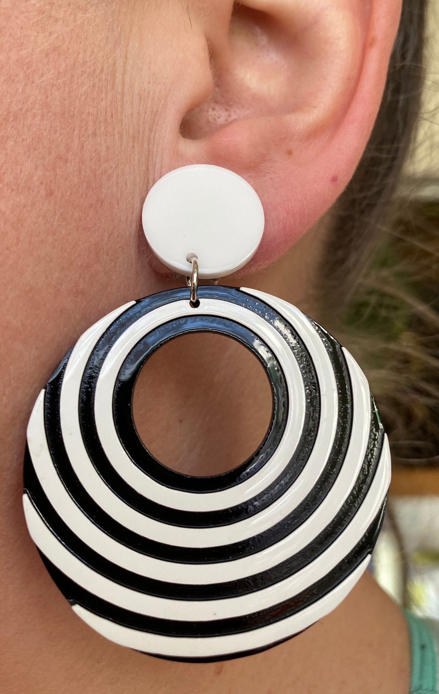 Gorgeous clip on dangling black and white plastic hoop earrings, striped hoops