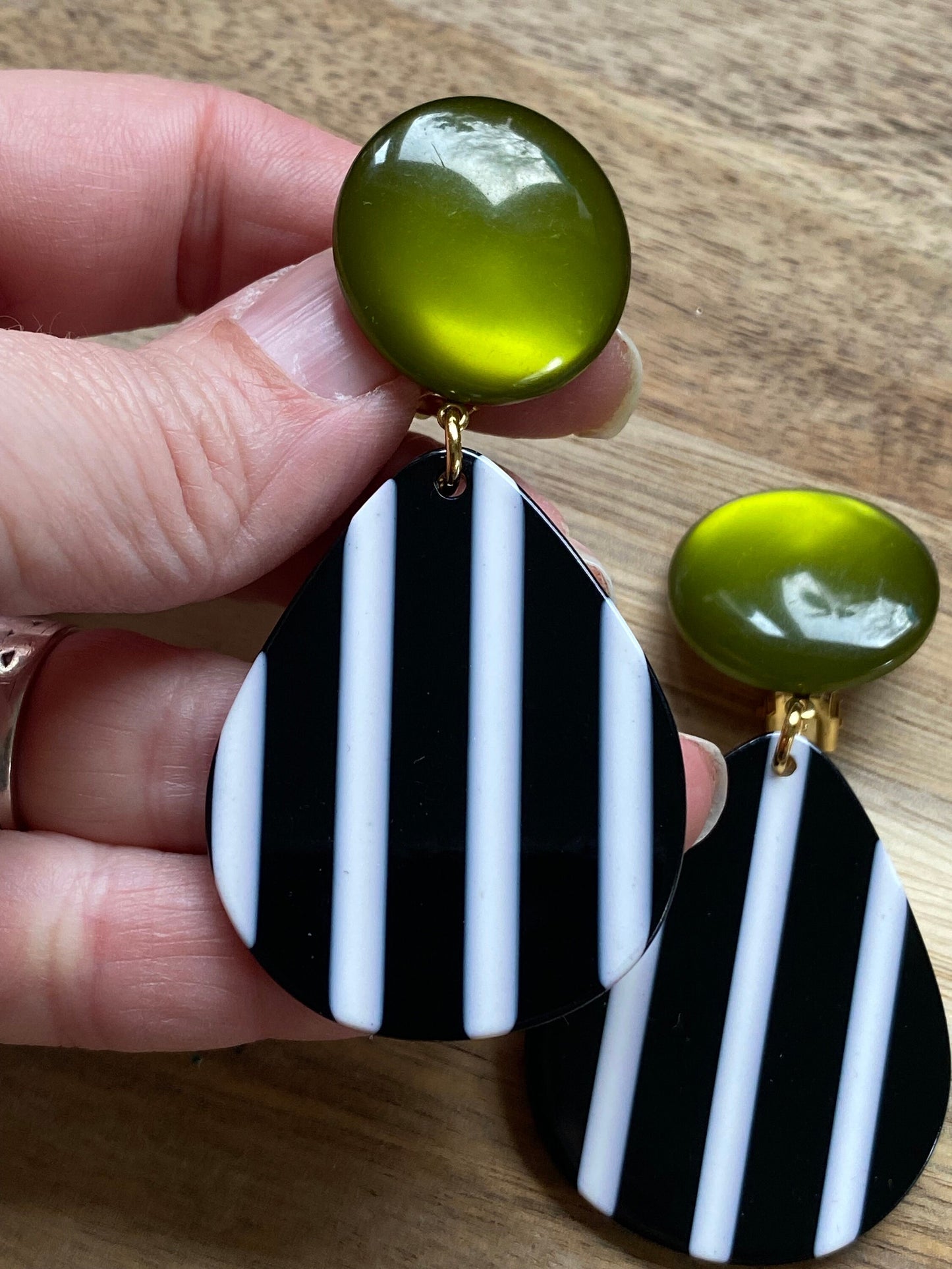 Oversized clip on green, black and white earrings