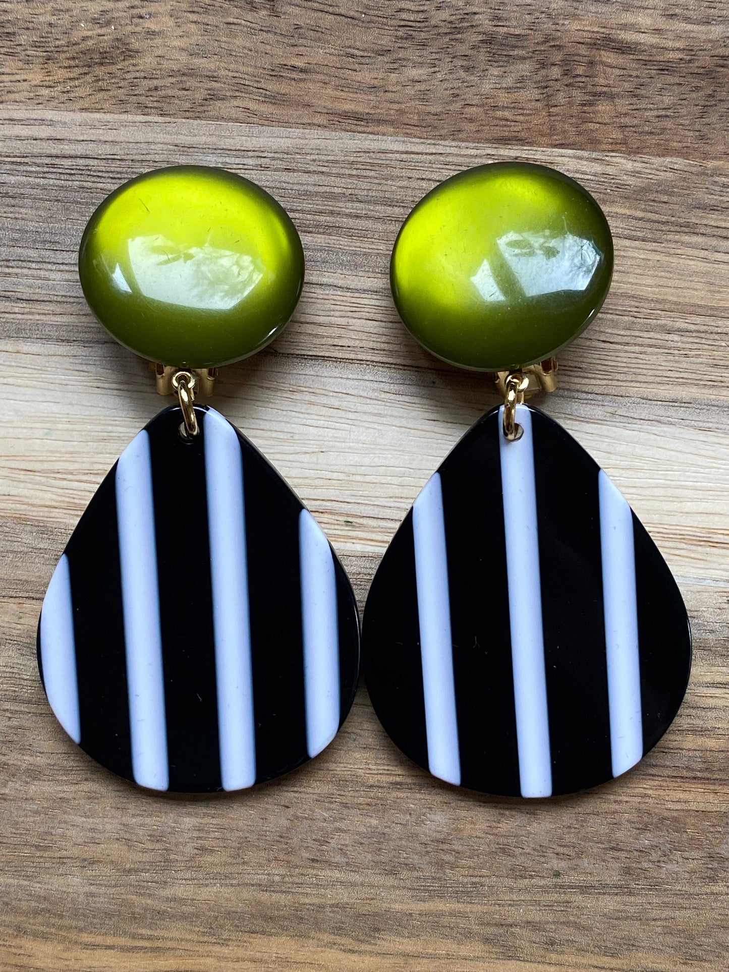 Oversized clip on green, black and white earrings