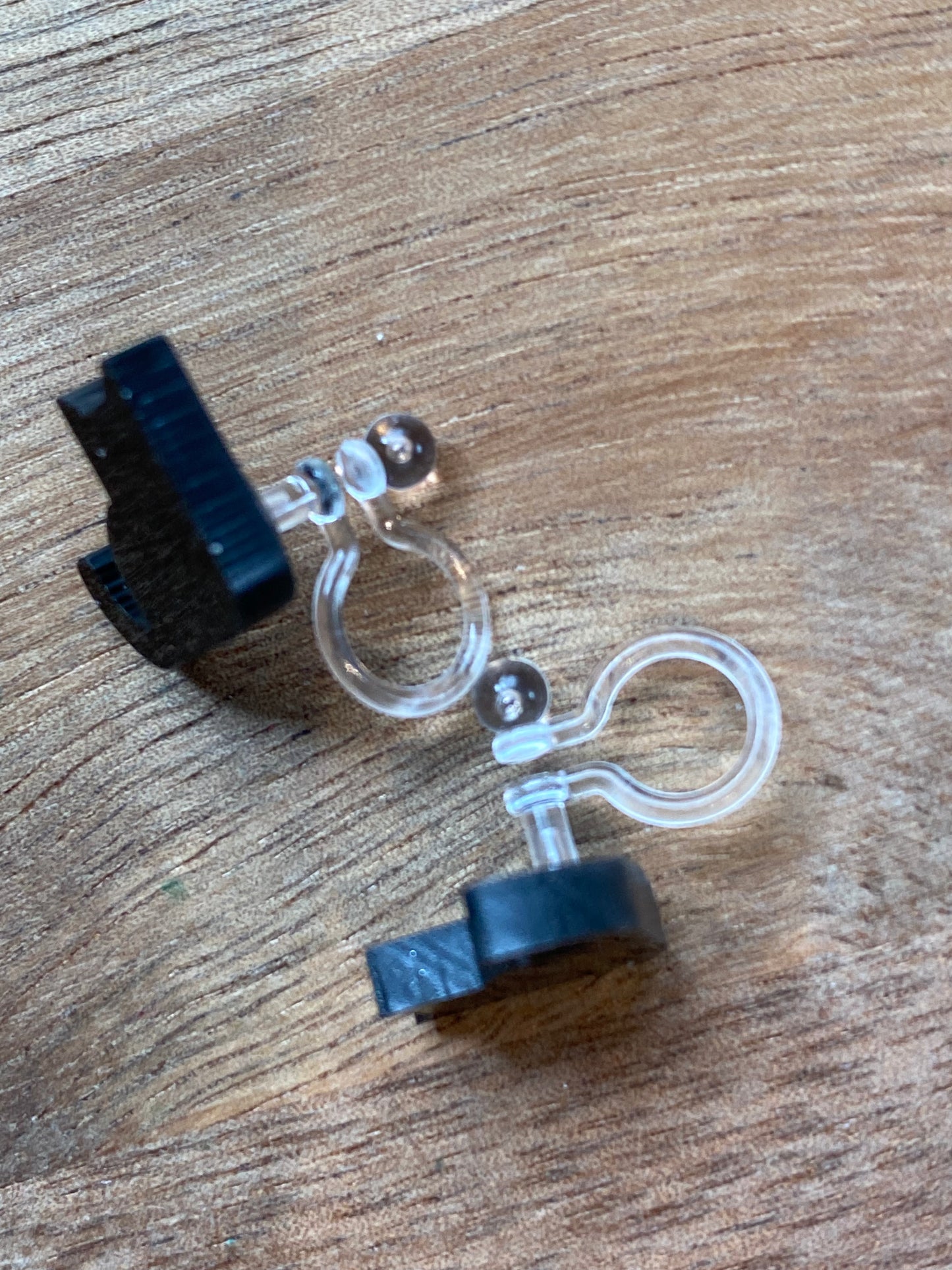 Tiny black cat invisible clip on earrings