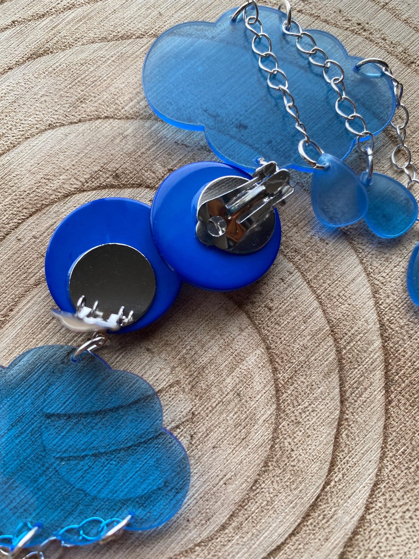 Large clip on blue dangling rain cloud earrings, translucent queen sized ear clips