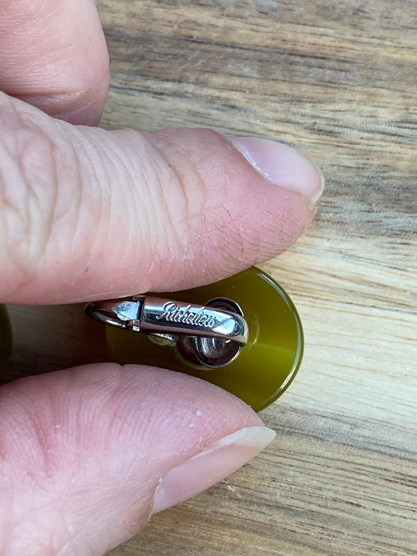 Vintage luminous olive green moonglow cabochon oval clip on earrings, Richelieu earrings