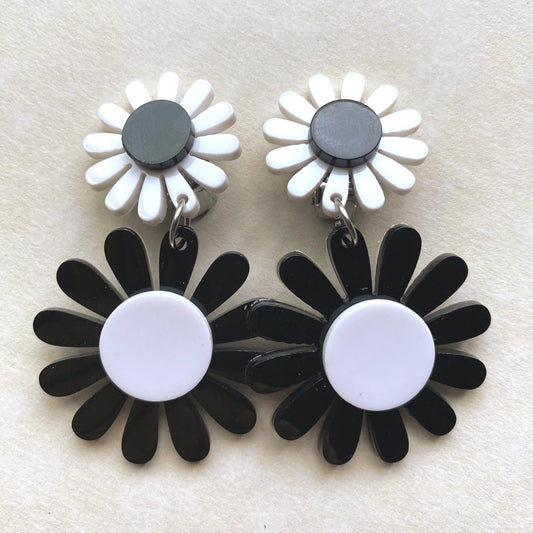 Dangling clip on earrings white and yellow or black  daisies flowers