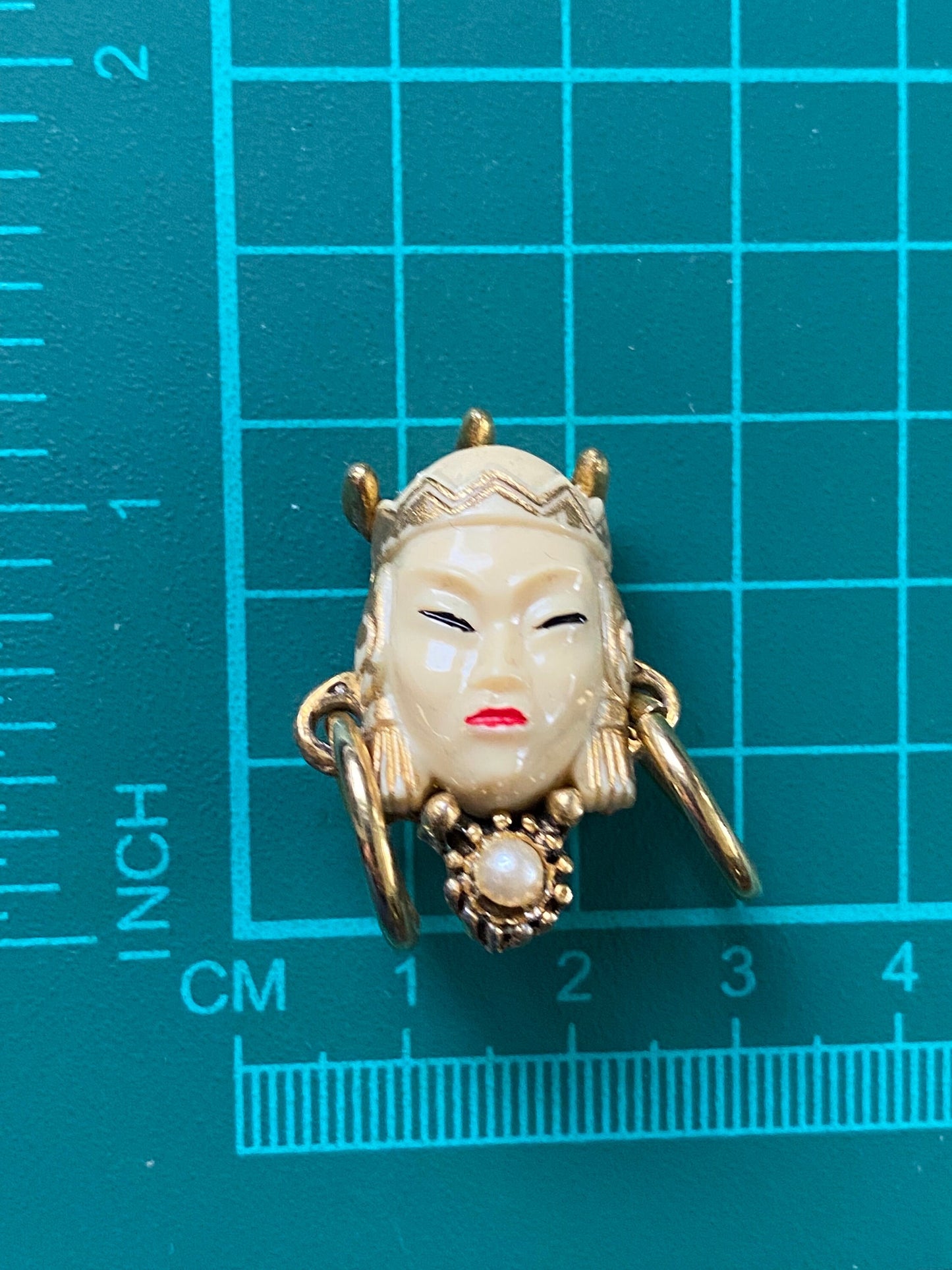 Vintage unsigned Selro Selini asian princess clip on earrings, antique designer earrings