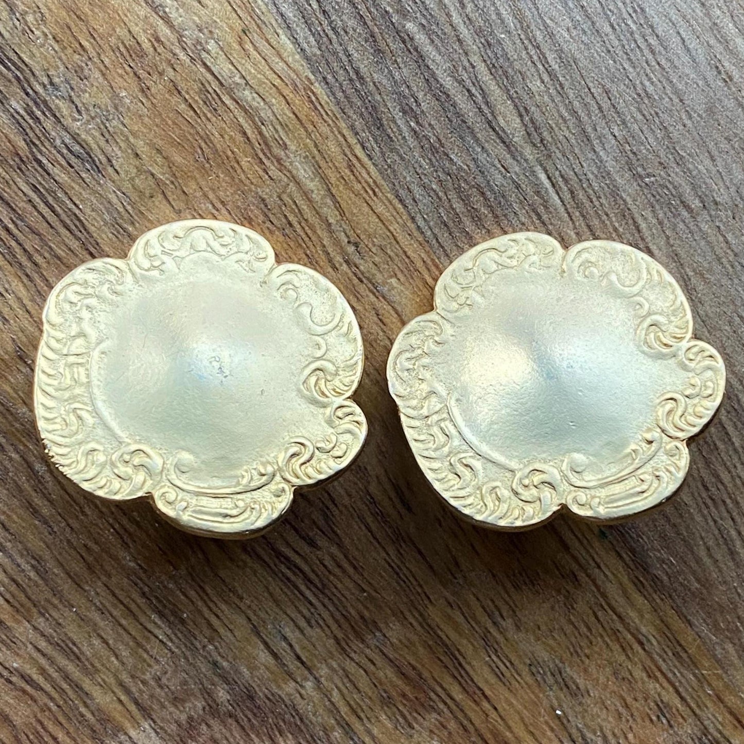 Vintage clip on matte gold button earrings with raised pattern