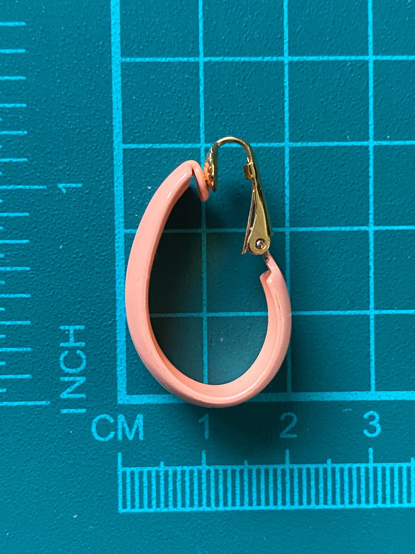 Vintage clip on oblong hoop earrings, peach or cream ear clips