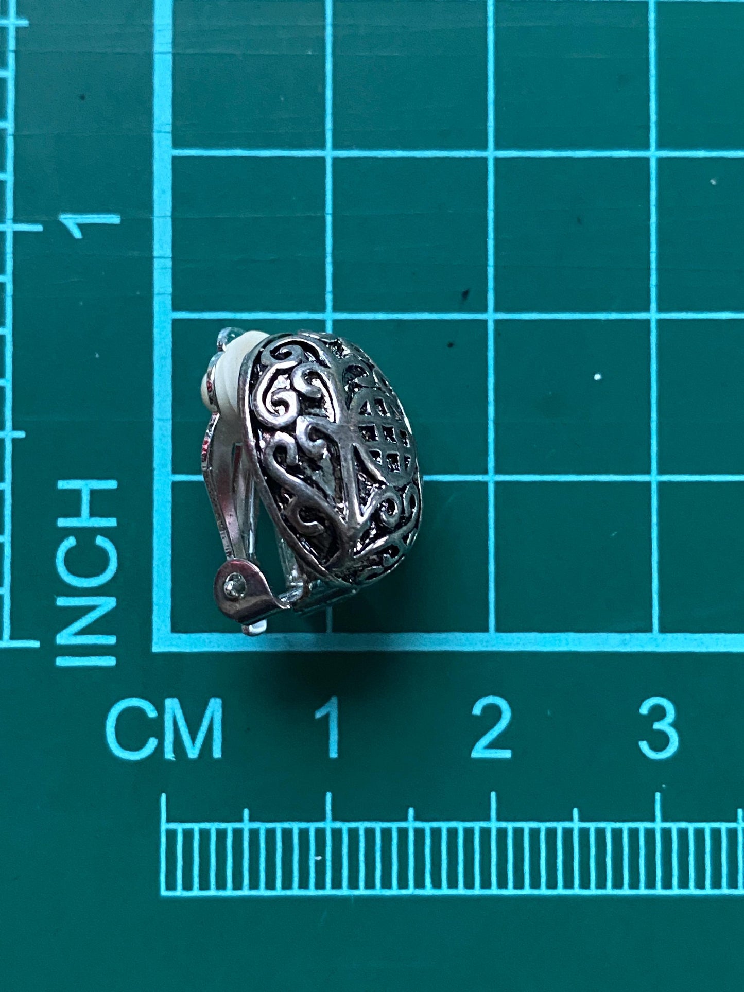 Vintage silver oval patterned clip on dome earrings