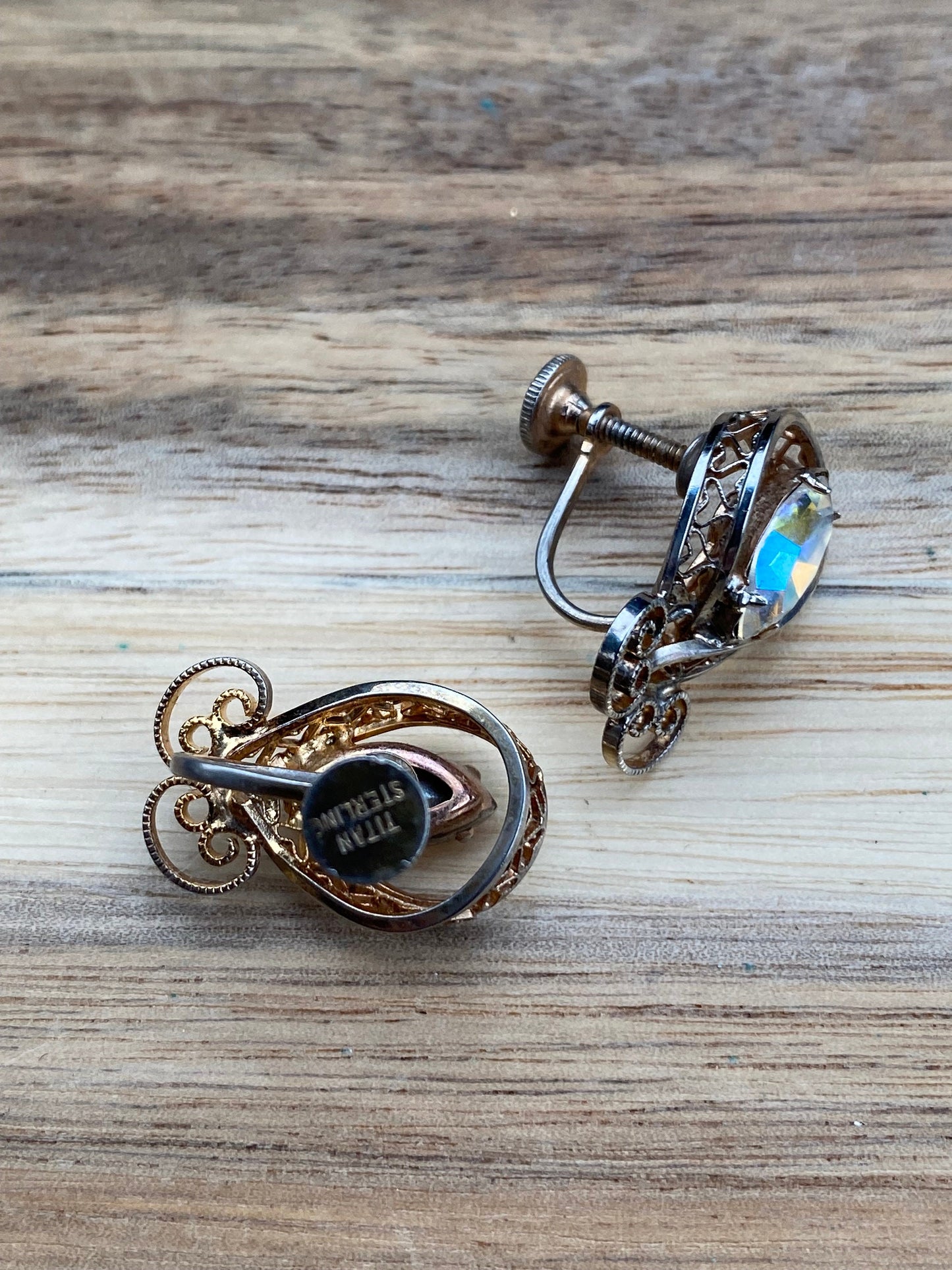 Vintage clip on rhinestone and filigree screwback earrings signed Titan Sterling
