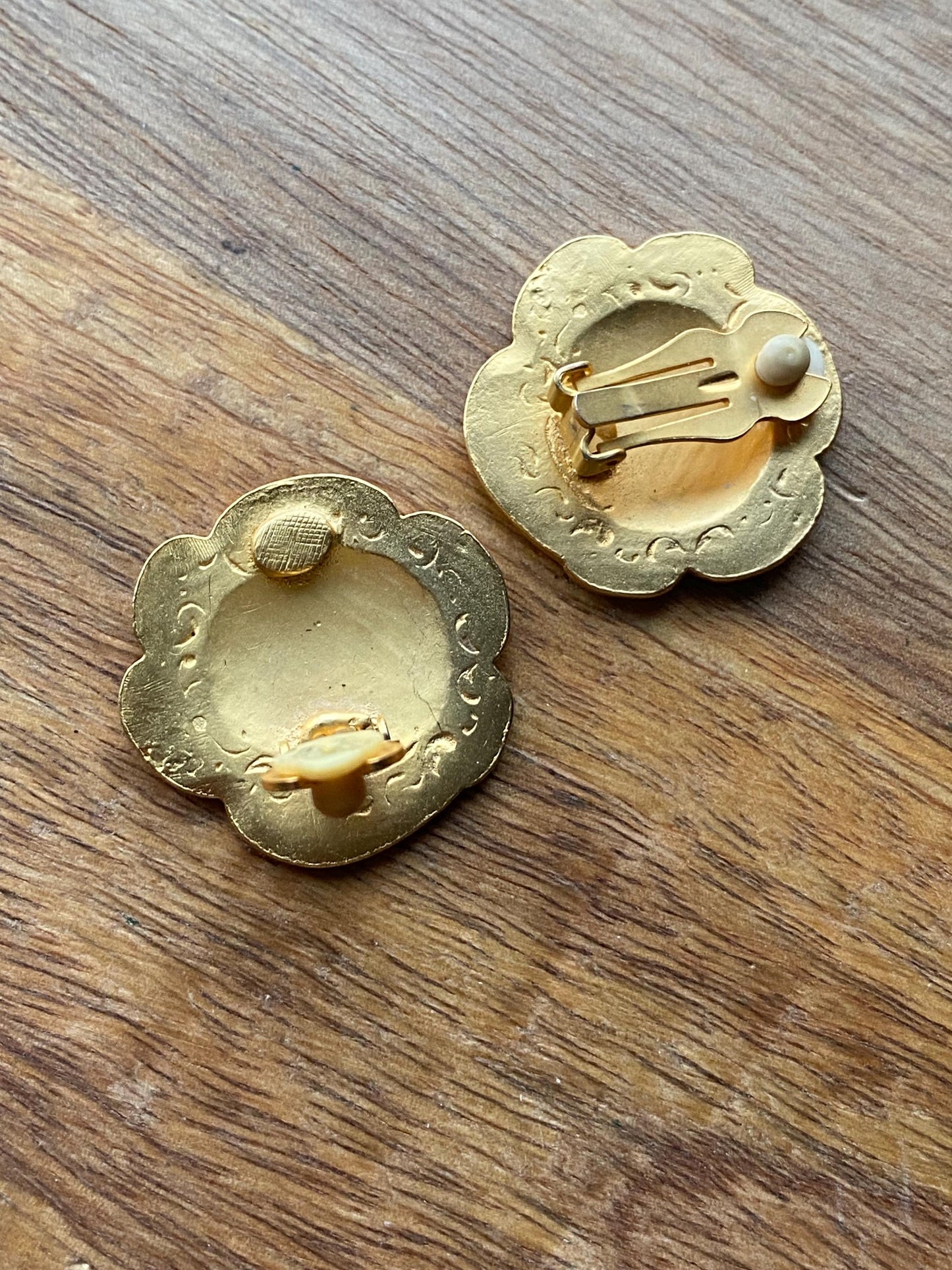 Vintage clip on matte gold button earrings with raised pattern