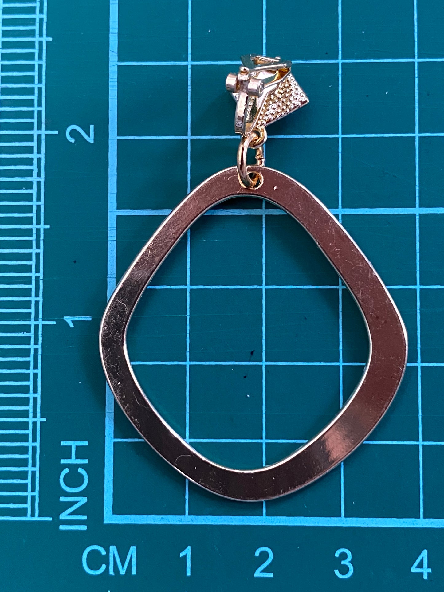 Dangling diamond shaped hoop clip on earrings