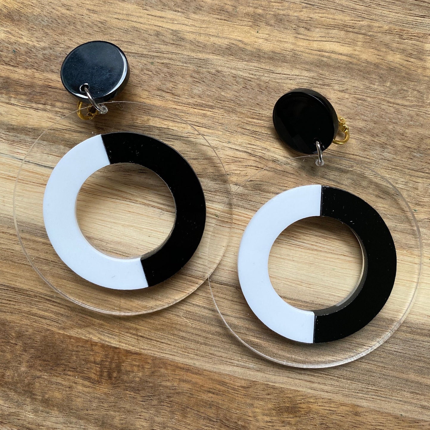 Oversized clip on black and white plastic hoop earrings