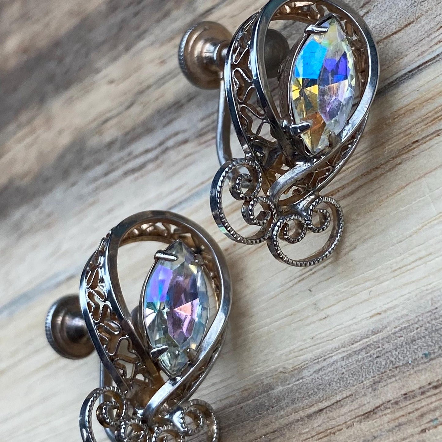 Vintage clip on rhinestone and filigree screwback earrings signed Titan Sterling