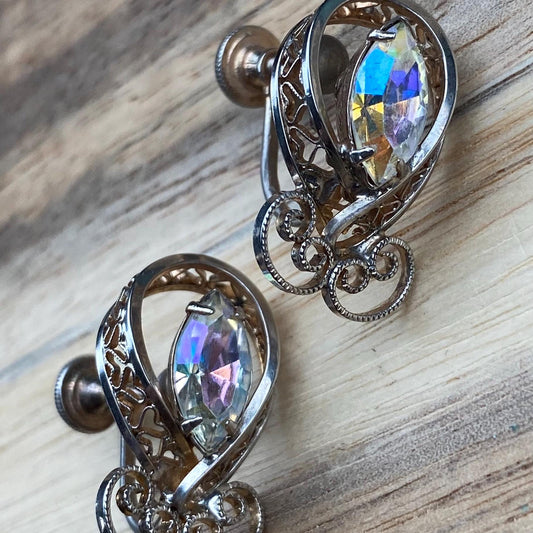 Vintage clip on rhinestone and filigree screwback earrings signed Titan Sterling