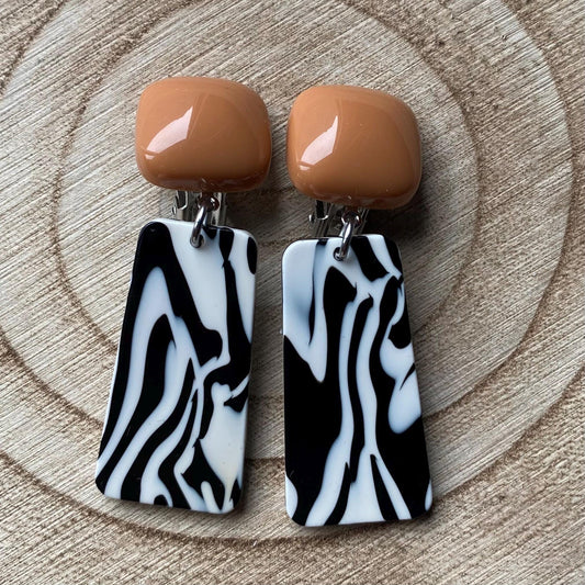 Dangling clip on plastic black and white marbled trapezoid earrings, mustard black and white ear clips