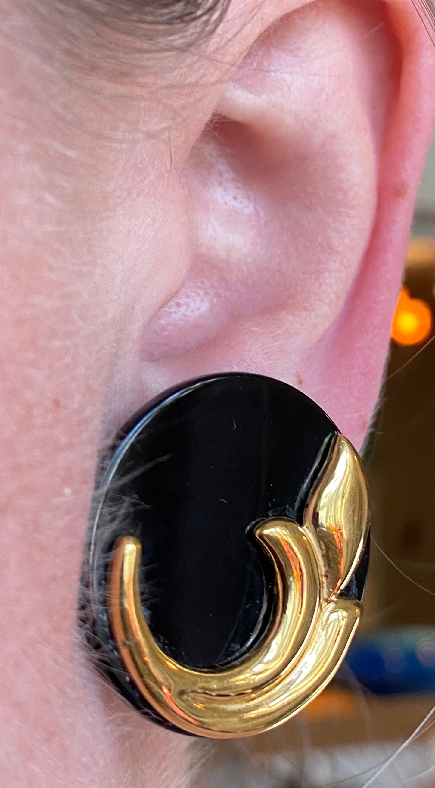 Vintage large unsigned FAC clip on earrings in gold with large black cabochons