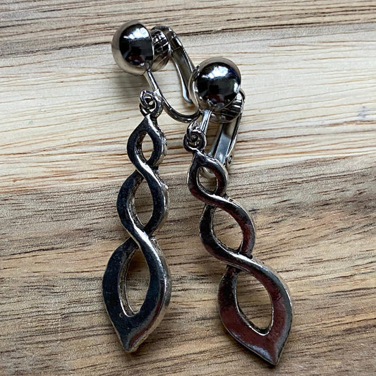 Dangling clip on silver infinity earrings