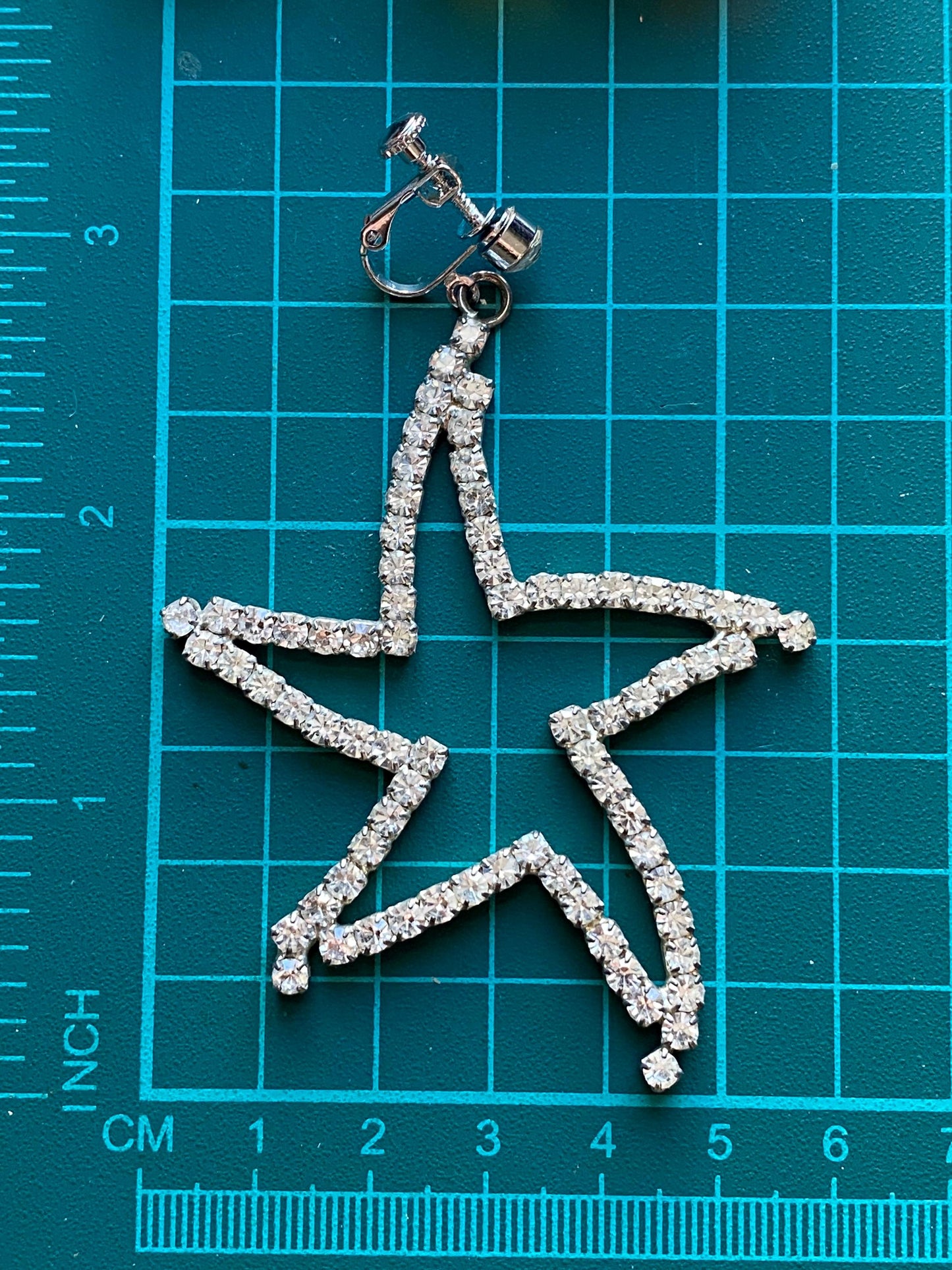 Vintage clip on dangling rhinestone star earrings