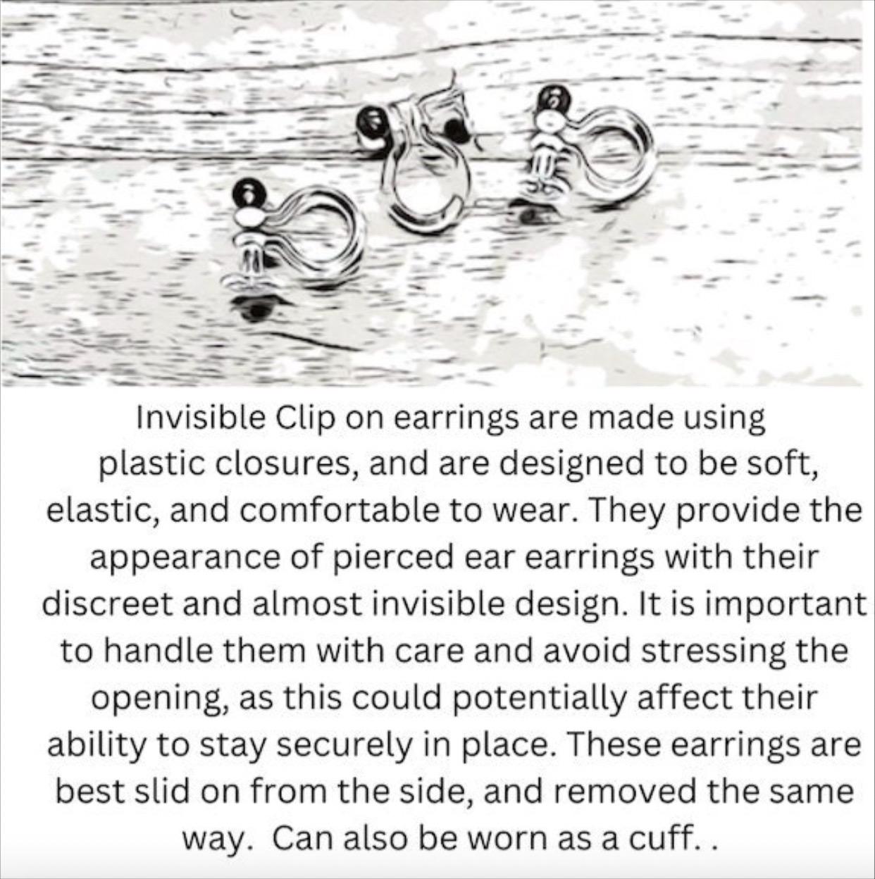 Dangling invisible clip on earrings with silver coloured lightbulb pendants