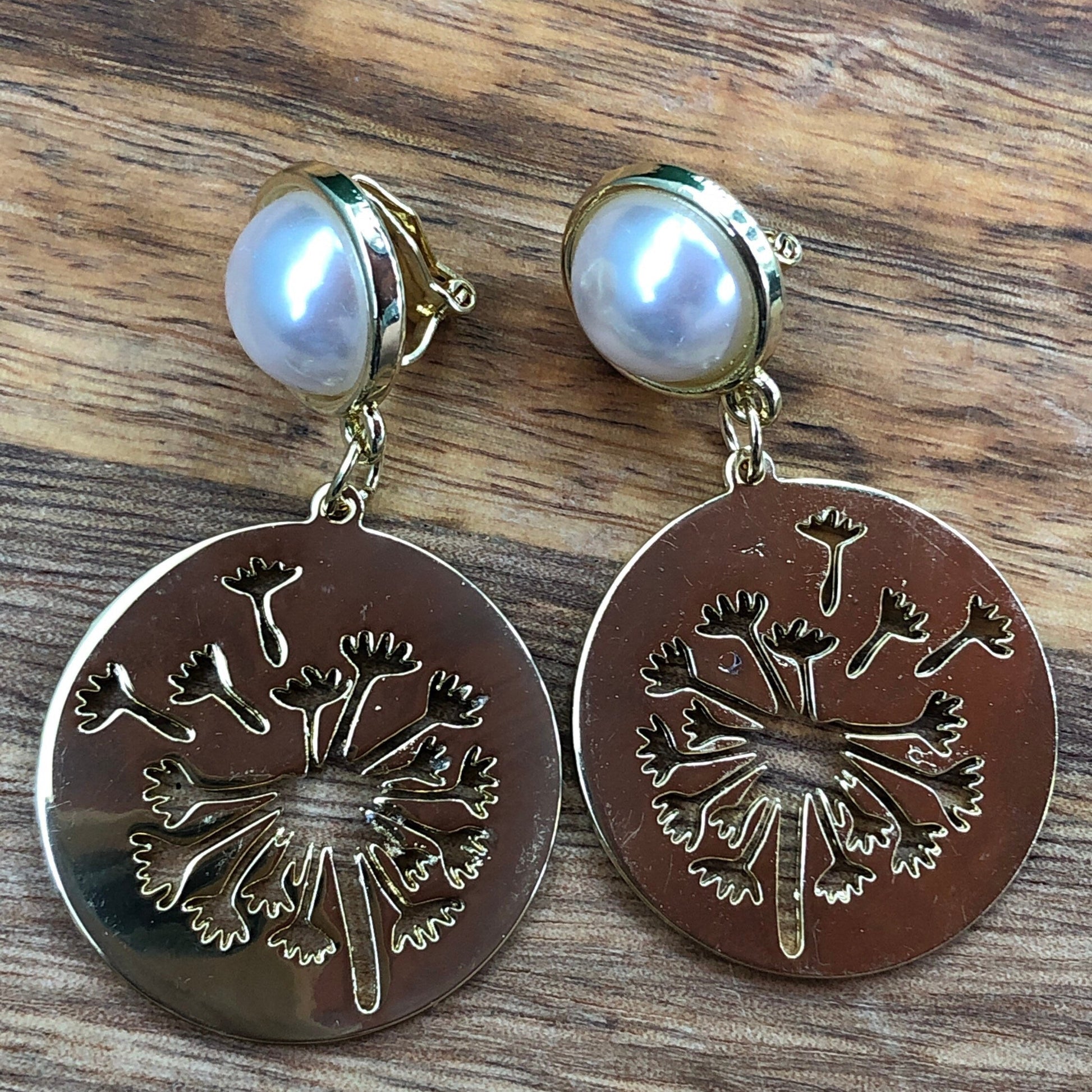 dangling dandelion clip on earrings