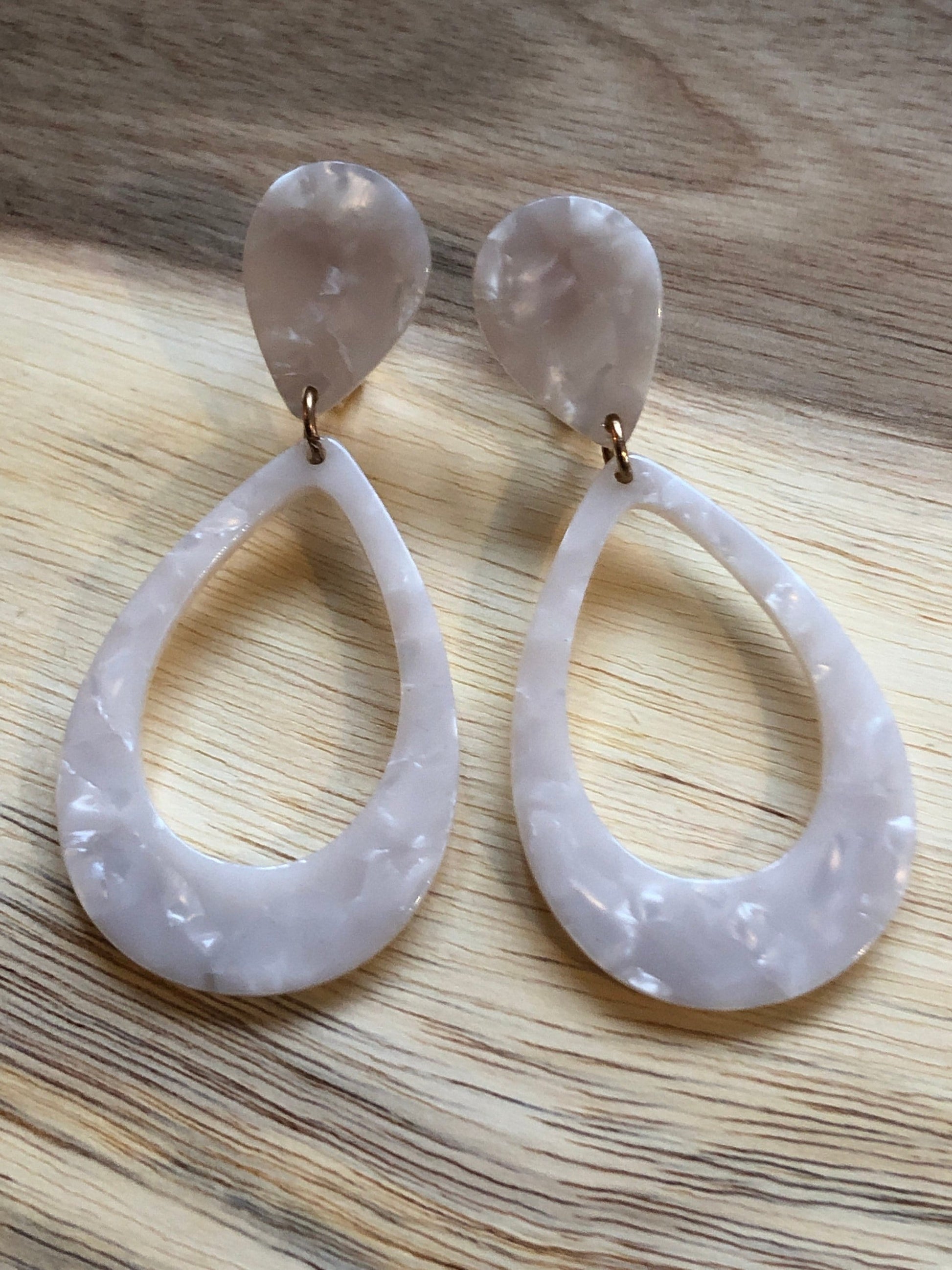 dangling teardrop shaped clip on earrings