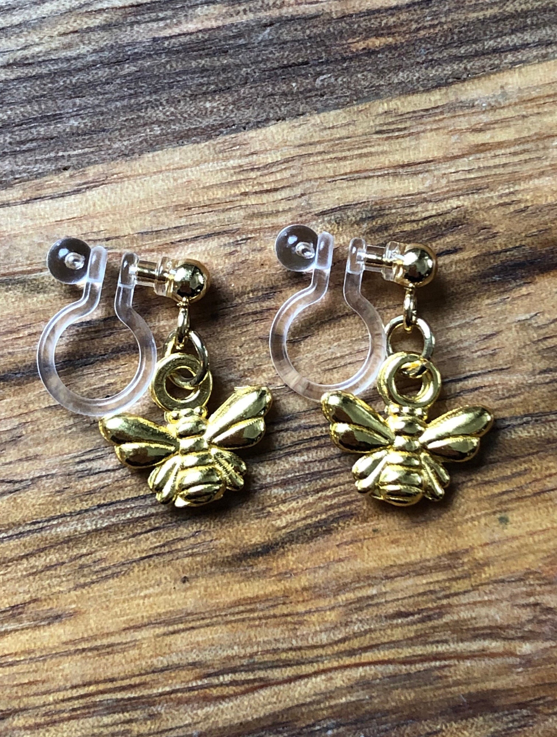 dangling bumblebee earrings, tiny invisible clip on earrings