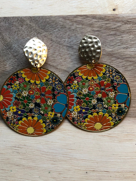 Dangling clip on floral medallion earrings with hammered gold clip closures